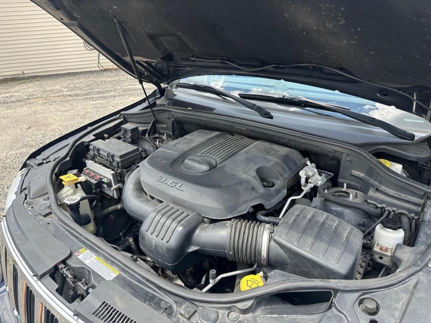 2011 BLUE JEEP GRAND CHEROKEE LAREDO (1J4RR4GGXBC) with an 3.6L engine, Automatic transmission, located at 1708 Broadway, Rockford, IL, 61104, (815) 397-5010, 42.252522, -89.069359 - Photo#16