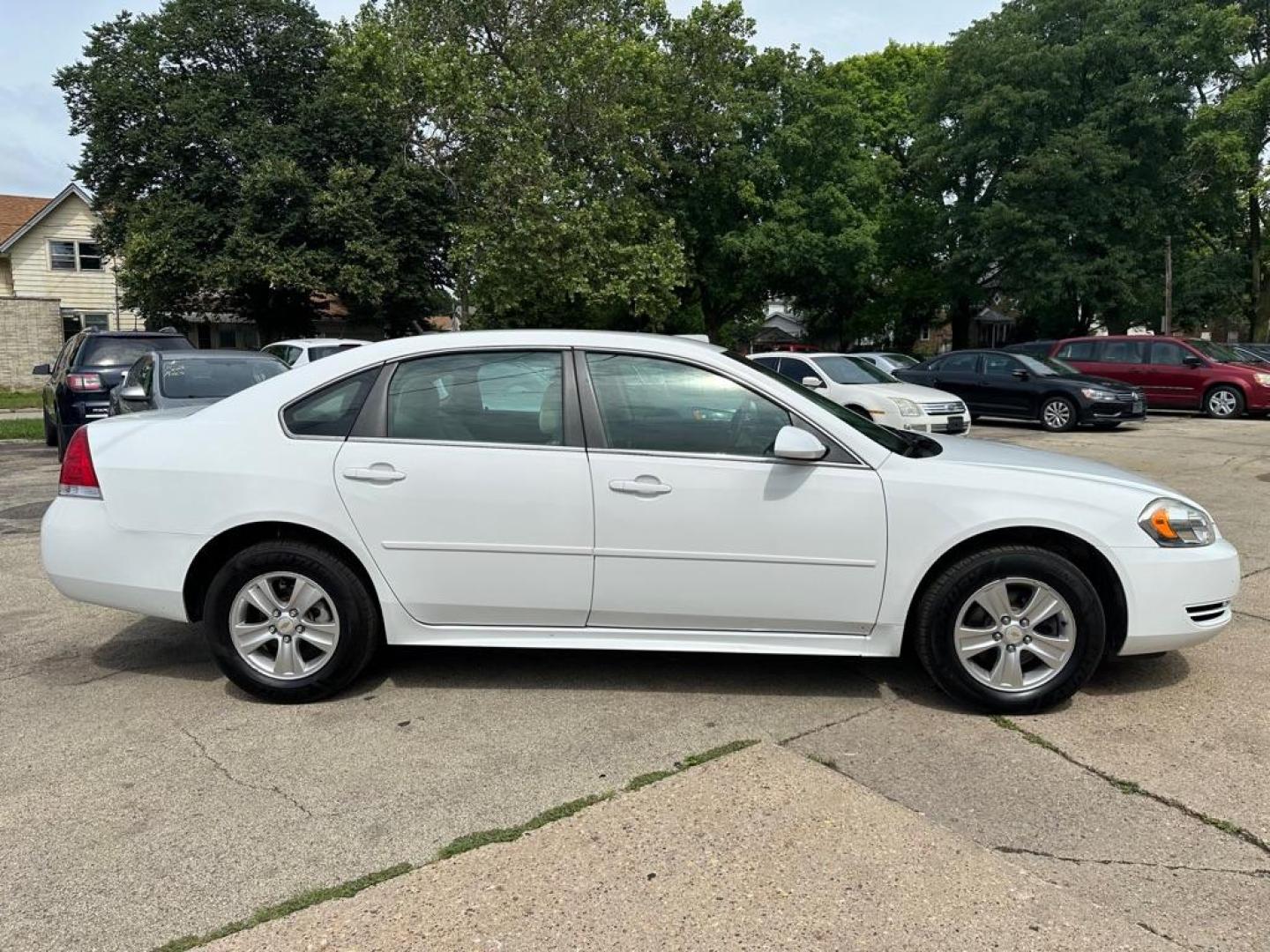 2014 WHITE CHEVROLET IMPALA LIMITED LS (2G1WA5E37E1) with an 3.6L engine, Automatic transmission, located at 1708 Broadway, Rockford, IL, 61104, (815) 397-5010, 42.252522, -89.069359 - Photo#2