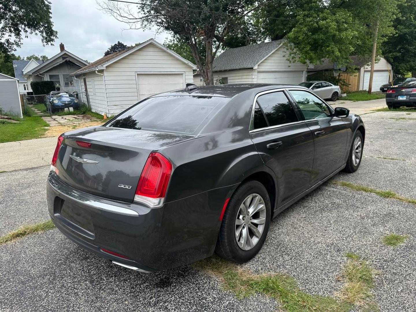 2015 GRAY CHRYSLER 300 LIMITED (2C3CCAAG8FH) with an 3.6L engine, Automatic transmission, located at 1708 Broadway, Rockford, IL, 61104, (815) 397-5010, 42.252522, -89.069359 - Photo#4