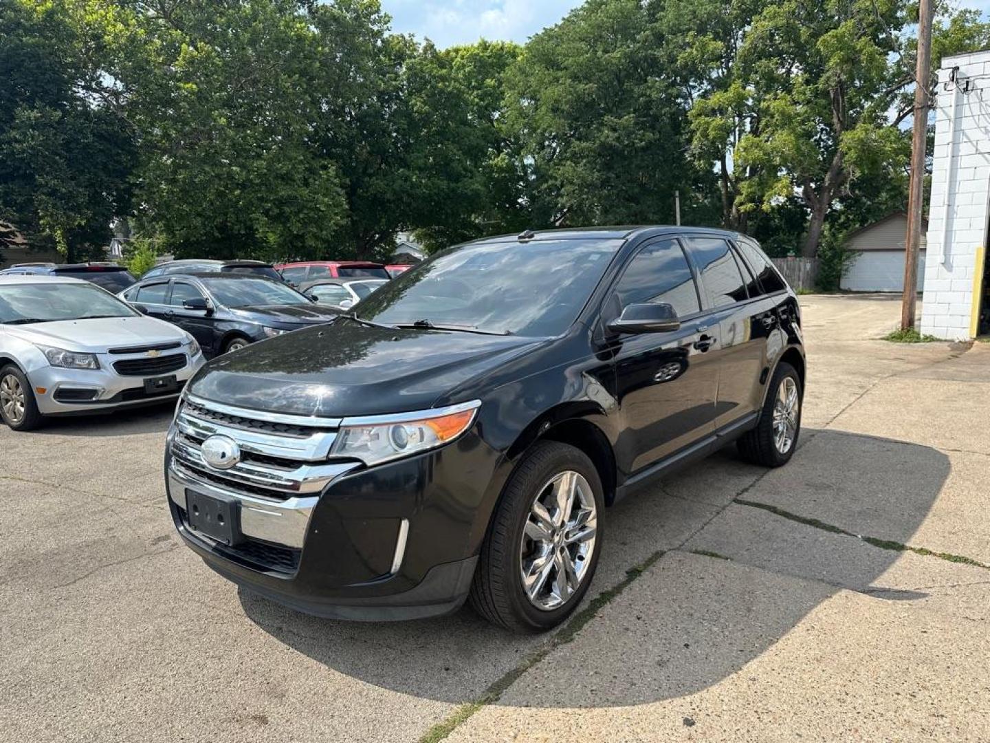 2012 BLACK FORD EDGE SEL (2FMDK4JC1CB) with an 3.5L engine, Automatic transmission, located at 1708 Broadway, Rockford, IL, 61104, (815) 397-5010, 42.252522, -89.069359 - Photo#0