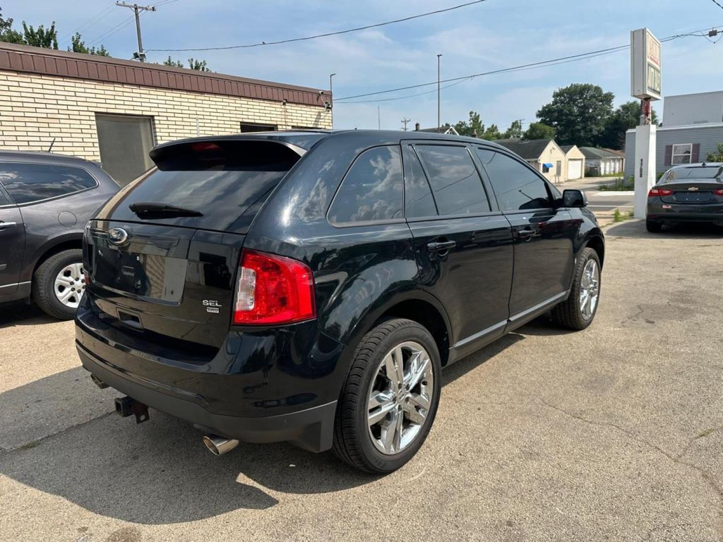 2012 BLACK FORD EDGE SEL (2FMDK4JC1CB) with an 3.5L engine, Automatic transmission, located at 1708 Broadway, Rockford, IL, 61104, (815) 397-5010, 42.252522, -89.069359 - Photo#4