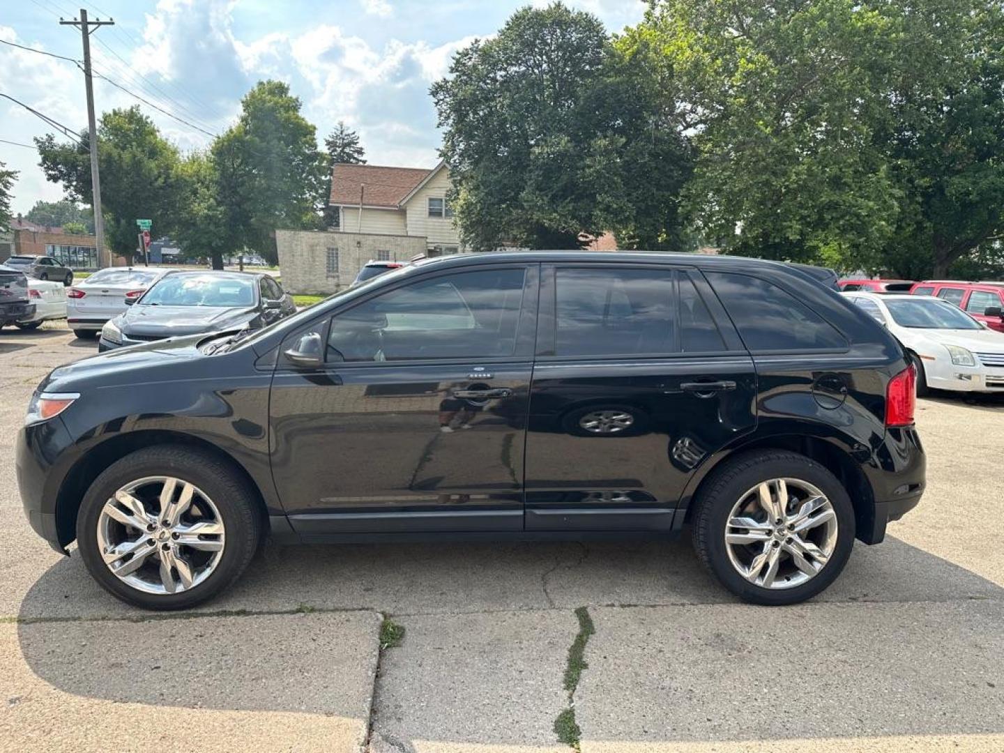 2012 BLACK FORD EDGE SEL (2FMDK4JC1CB) with an 3.5L engine, Automatic transmission, located at 1708 Broadway, Rockford, IL, 61104, (815) 397-5010, 42.252522, -89.069359 - Photo#7