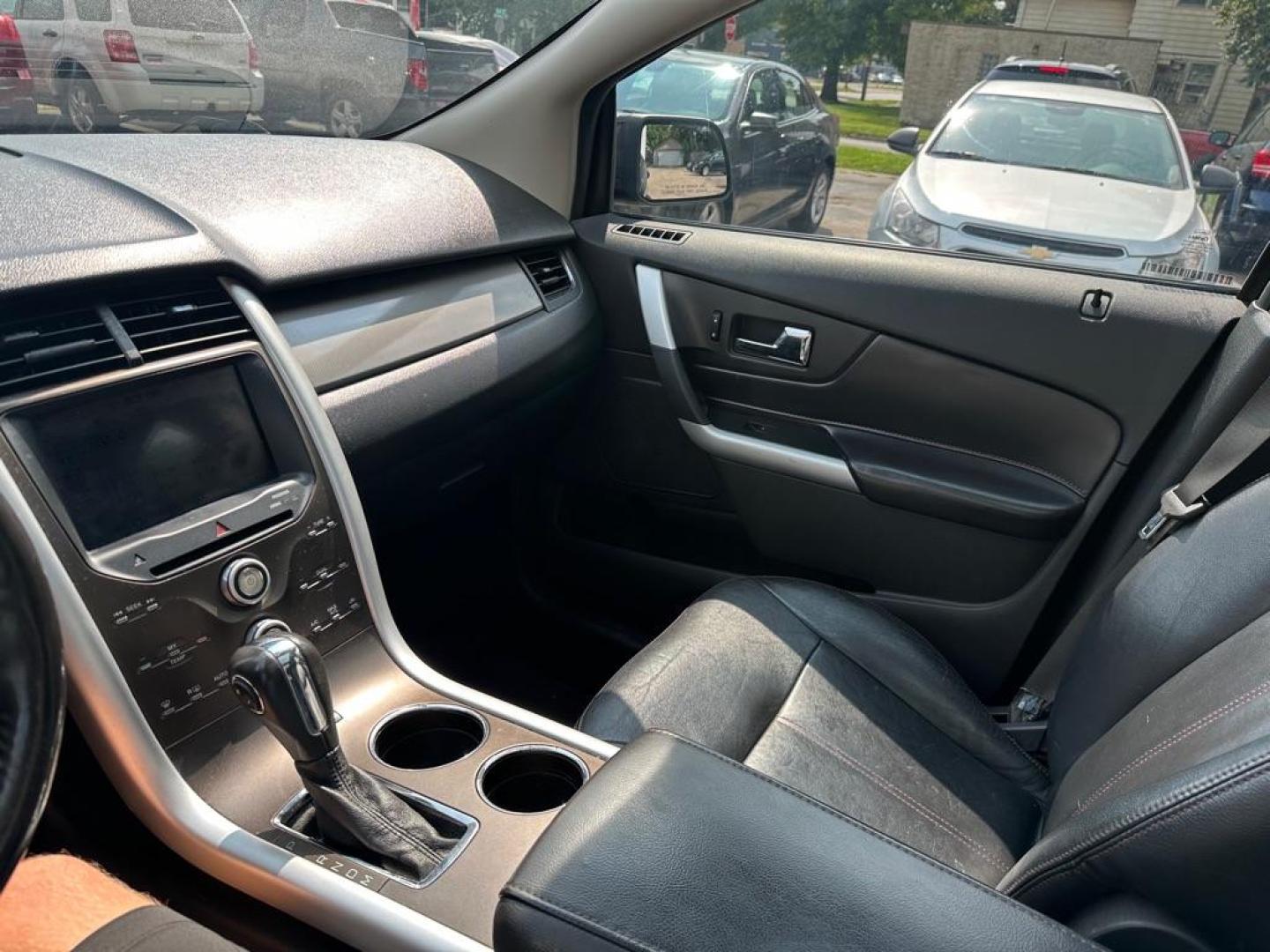 2012 BLACK FORD EDGE SEL (2FMDK4JC1CB) with an 3.5L engine, Automatic transmission, located at 1708 Broadway, Rockford, IL, 61104, (815) 397-5010, 42.252522, -89.069359 - Photo#14