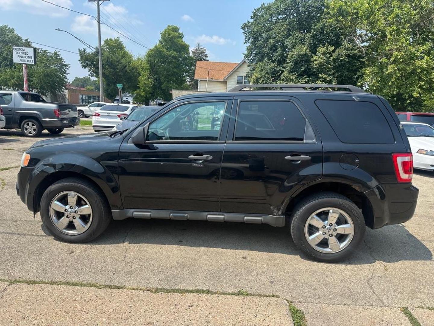 2010 BLACK FORD ESCAPE XLT (1FMCU0DG3AK) with an 3.0L engine, Automatic transmission, located at 1708 Broadway, Rockford, IL, 61104, (815) 397-5010, 42.252522, -89.069359 - Photo#7