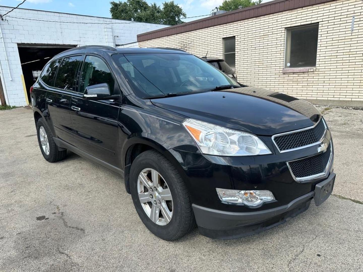 2010 BLACK CHEVROLET TRAVERSE LT (1GNLVGED1AJ) with an 3.6L engine, Automatic transmission, located at 1708 Broadway, Rockford, IL, 61104, (815) 397-5010, 42.252522, -89.069359 - Photo#2