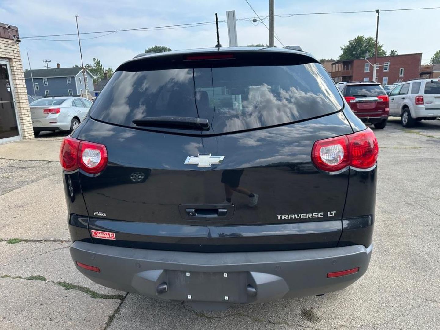 2010 BLACK CHEVROLET TRAVERSE LT (1GNLVGED1AJ) with an 3.6L engine, Automatic transmission, located at 1708 Broadway, Rockford, IL, 61104, (815) 397-5010, 42.252522, -89.069359 - Photo#5