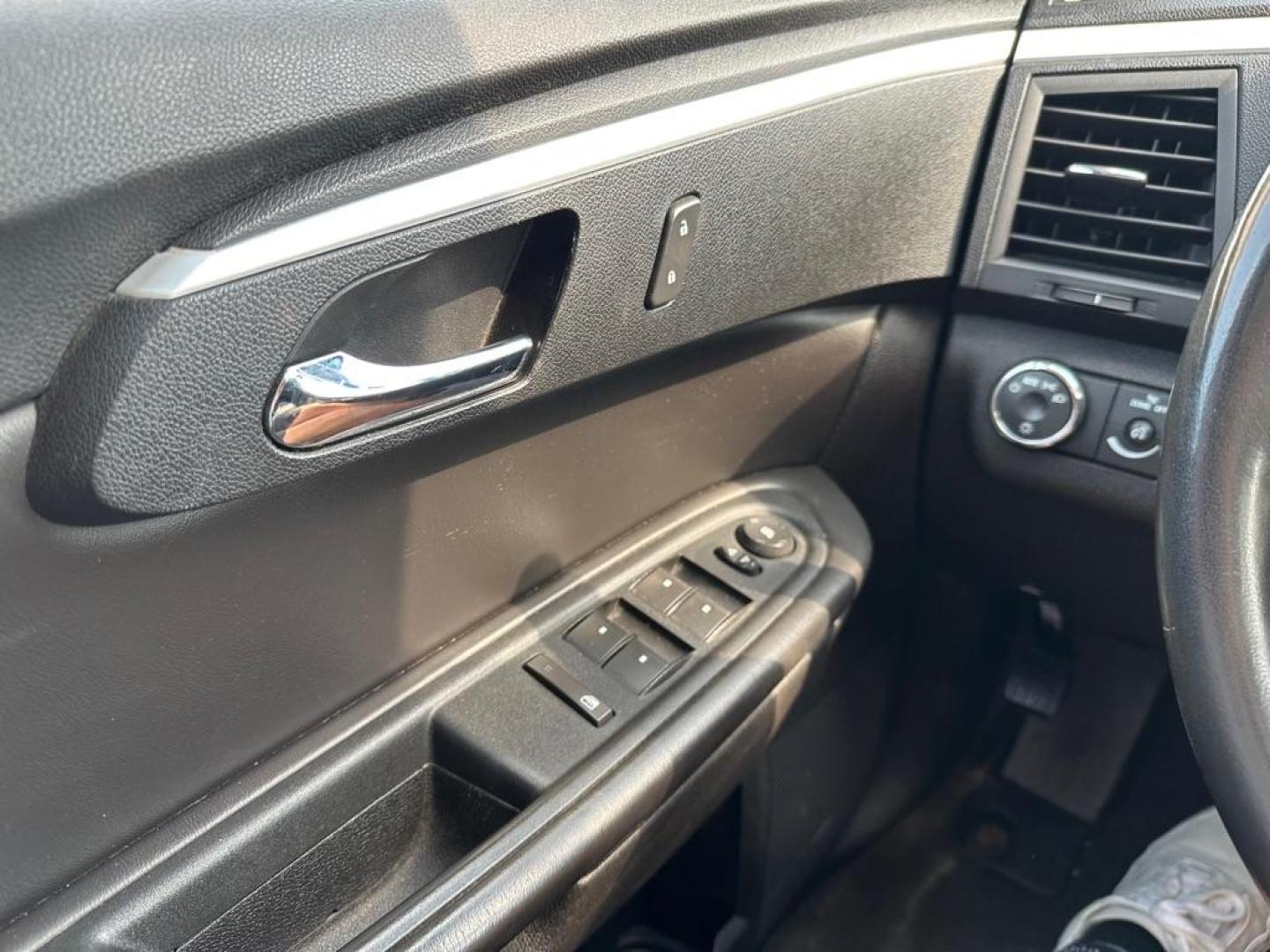 2010 BLACK CHEVROLET TRAVERSE LT (1GNLVGED1AJ) with an 3.6L engine, Automatic transmission, located at 1708 Broadway, Rockford, IL, 61104, (815) 397-5010, 42.252522, -89.069359 - Photo#13