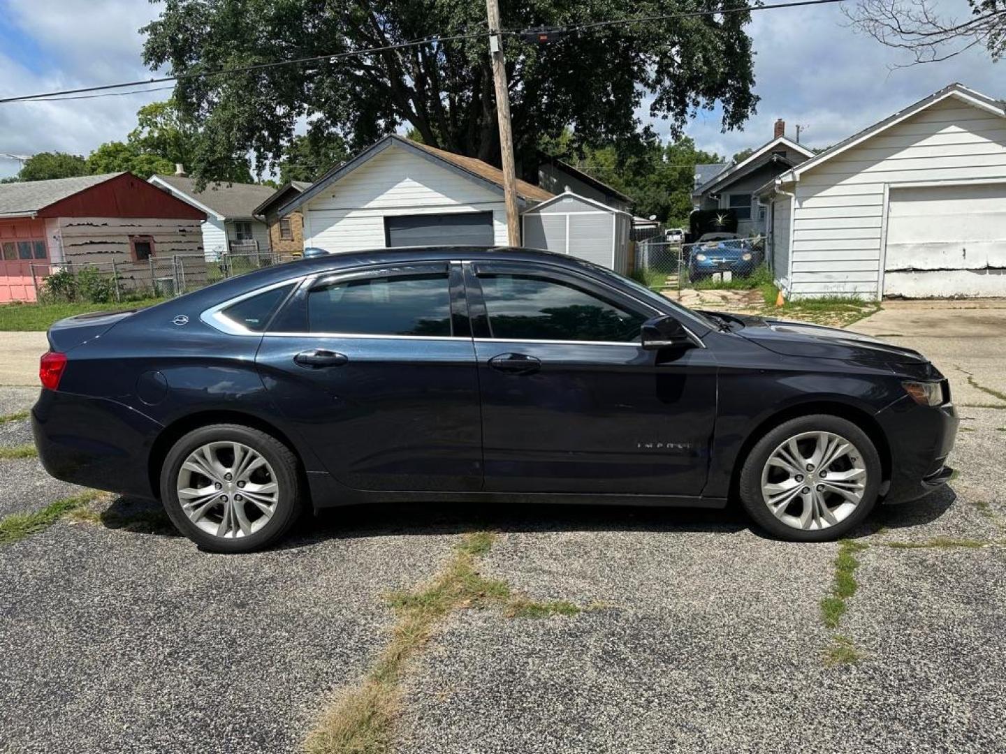 2014 BLUE CHEVROLET IMPALA LT (2G1125S38E9) with an 3.6L engine, Automatic transmission, located at 1708 Broadway, Rockford, IL, 61104, (815) 397-5010, 42.252522, -89.069359 - Photo#2