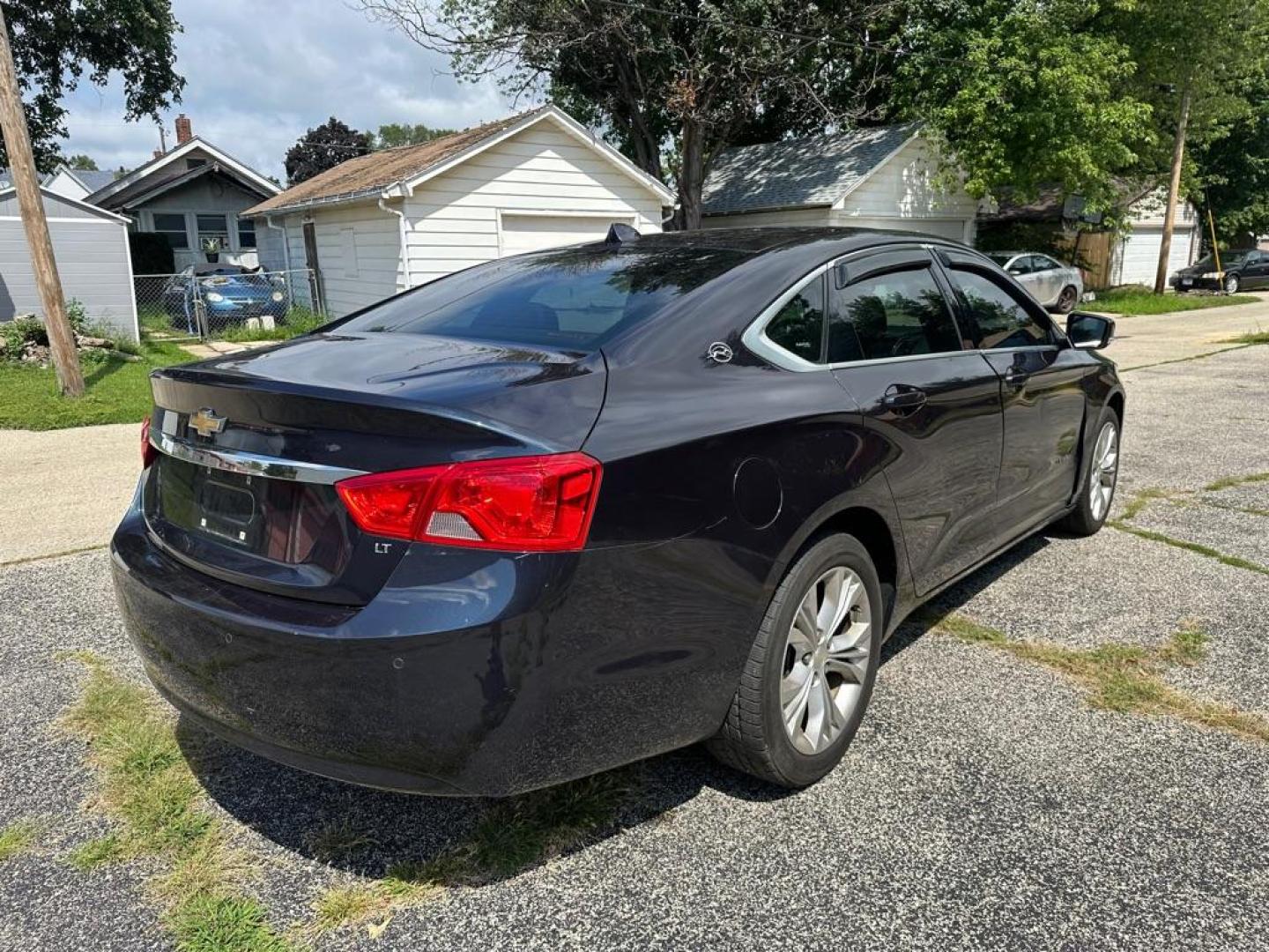 2014 BLUE CHEVROLET IMPALA LT (2G1125S38E9) with an 3.6L engine, Automatic transmission, located at 1708 Broadway, Rockford, IL, 61104, (815) 397-5010, 42.252522, -89.069359 - Photo#3