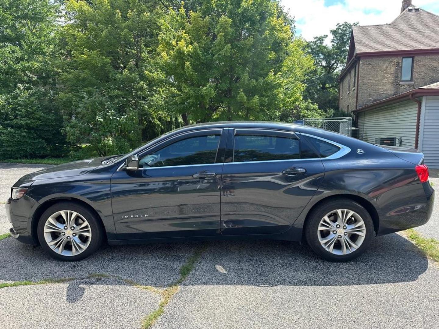2014 BLUE CHEVROLET IMPALA LT (2G1125S38E9) with an 3.6L engine, Automatic transmission, located at 1708 Broadway, Rockford, IL, 61104, (815) 397-5010, 42.252522, -89.069359 - Photo#6