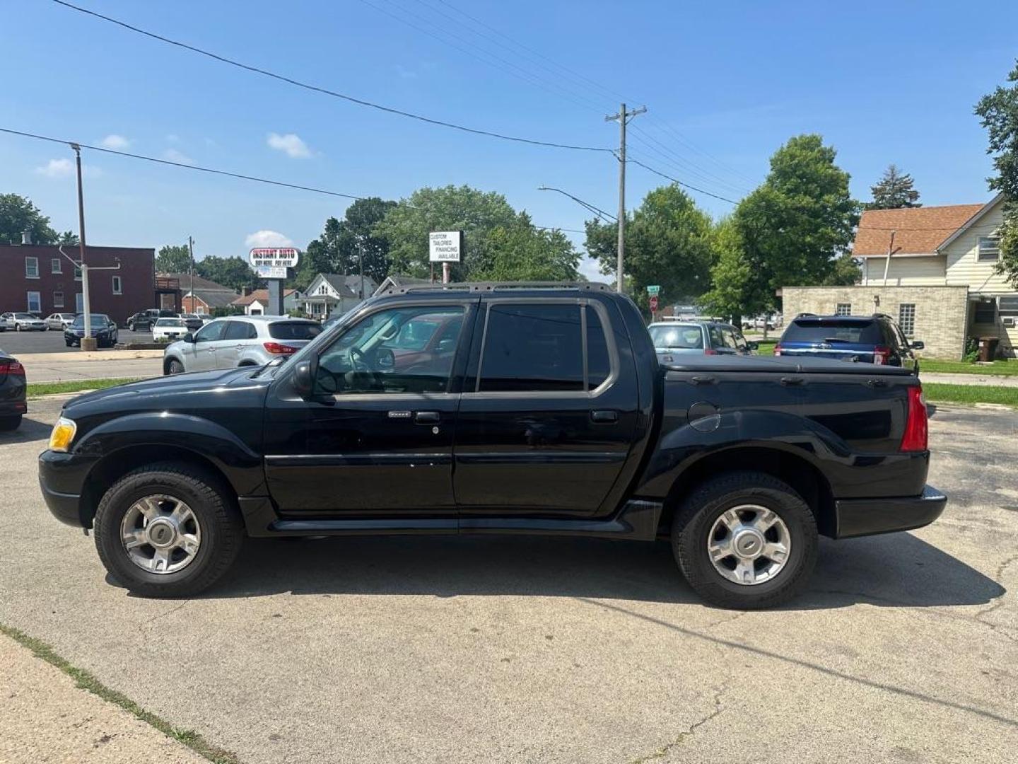 2004 BLACK FORD EXPLORER SPORT (1FMZU77KX4U) with an 4.0L engine, Automatic transmission, located at 1708 Broadway, Rockford, IL, 61104, (815) 397-5010, 42.252522, -89.069359 - Photo#6