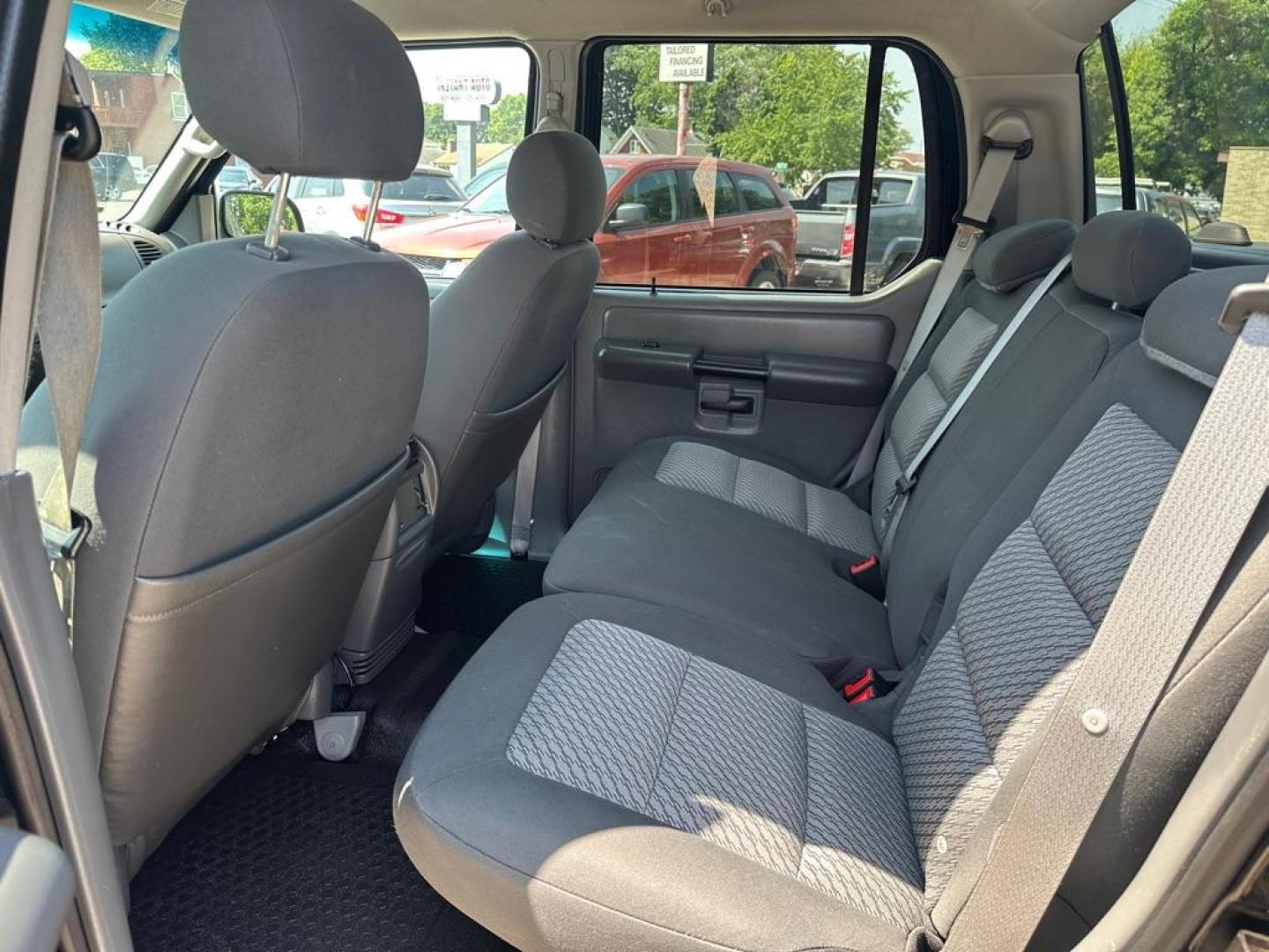 2004 BLACK FORD EXPLORER SPORT (1FMZU77KX4U) with an 4.0L engine, Automatic transmission, located at 1708 Broadway, Rockford, IL, 61104, (815) 397-5010, 42.252522, -89.069359 - Photo#8