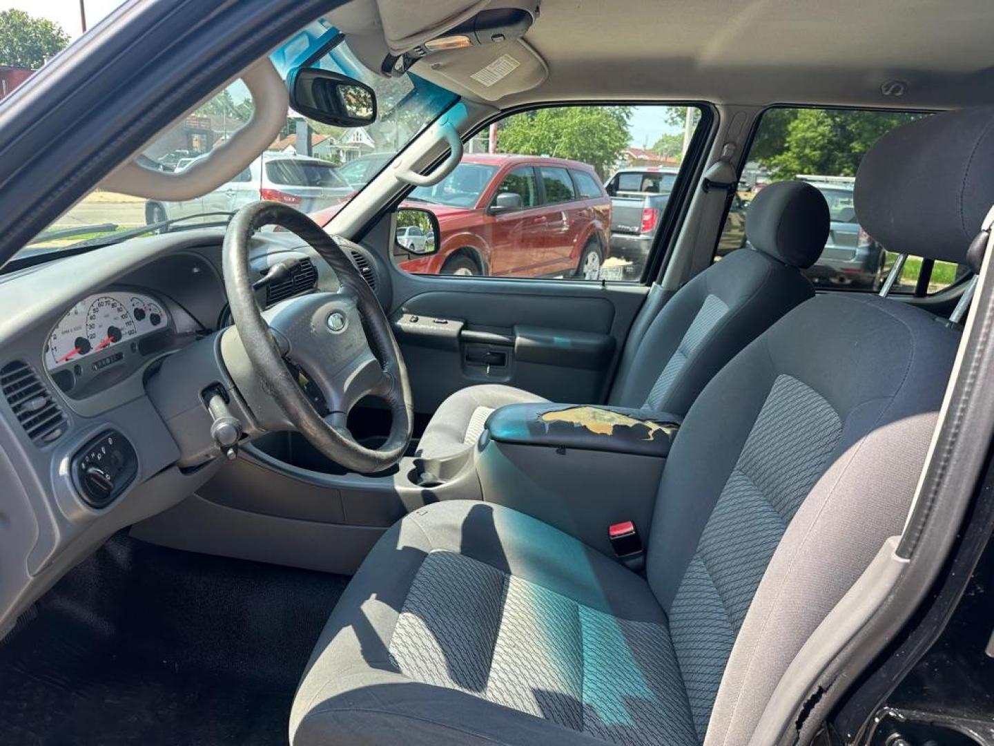 2004 BLACK FORD EXPLORER SPORT (1FMZU77KX4U) with an 4.0L engine, Automatic transmission, located at 1708 Broadway, Rockford, IL, 61104, (815) 397-5010, 42.252522, -89.069359 - Photo#10