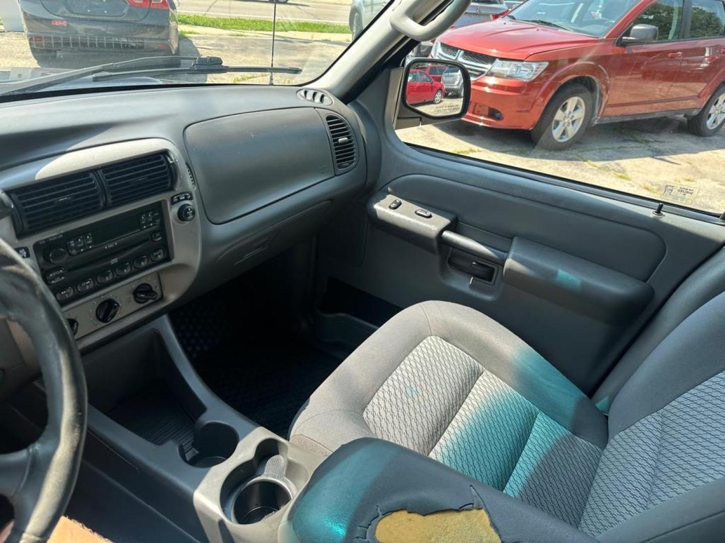 2004 BLACK FORD EXPLORER SPORT (1FMZU77KX4U) with an 4.0L engine, Automatic transmission, located at 1708 Broadway, Rockford, IL, 61104, (815) 397-5010, 42.252522, -89.069359 - Photo#12