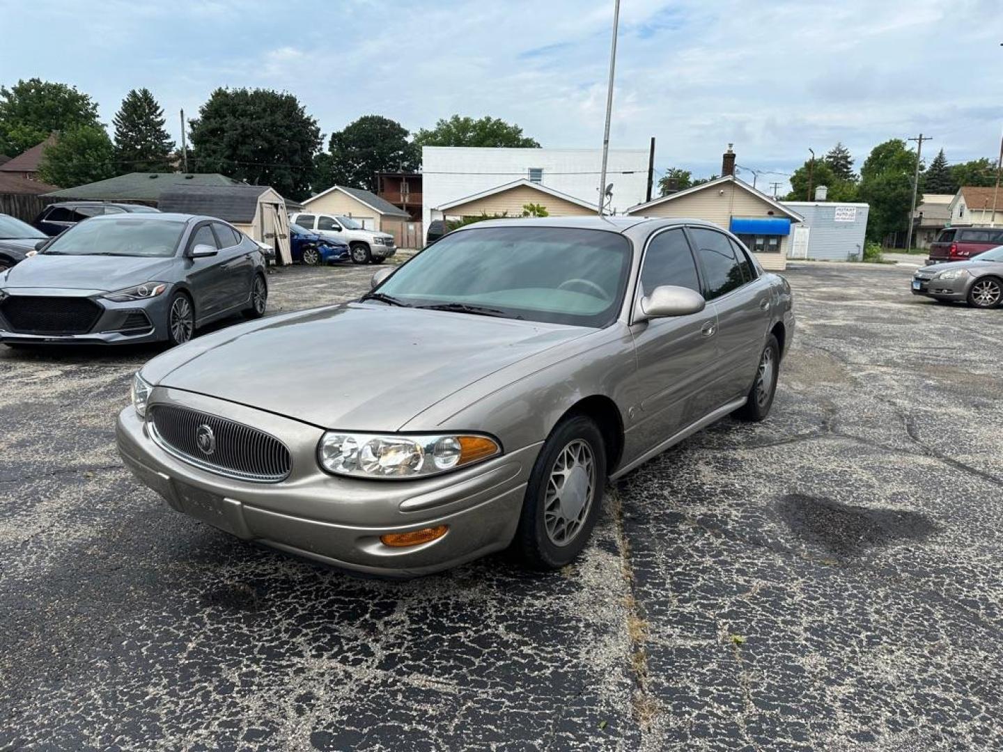 2002 TAN BUICK LESABRE CUSTOM (1G4HP54K424) with an 3.8L engine, Automatic transmission, located at 1708 Broadway, Rockford, IL, 61104, (815) 397-5010, 42.252522, -89.069359 - Photo#2