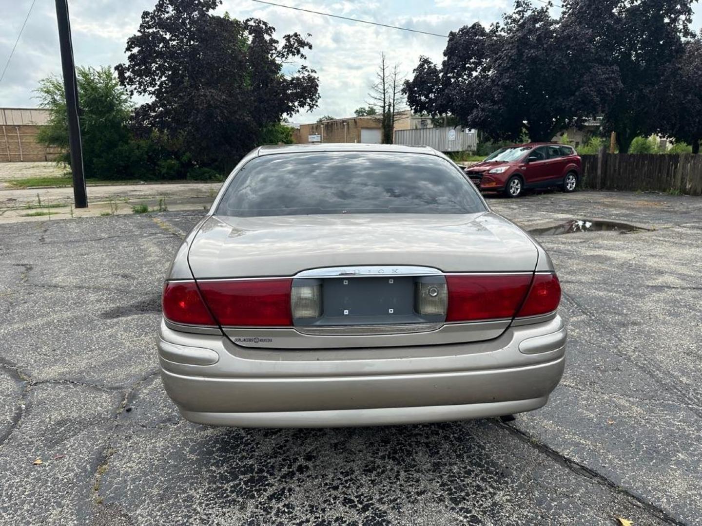 2002 TAN BUICK LESABRE CUSTOM (1G4HP54K424) with an 3.8L engine, Automatic transmission, located at 1708 Broadway, Rockford, IL, 61104, (815) 397-5010, 42.252522, -89.069359 - Photo#5