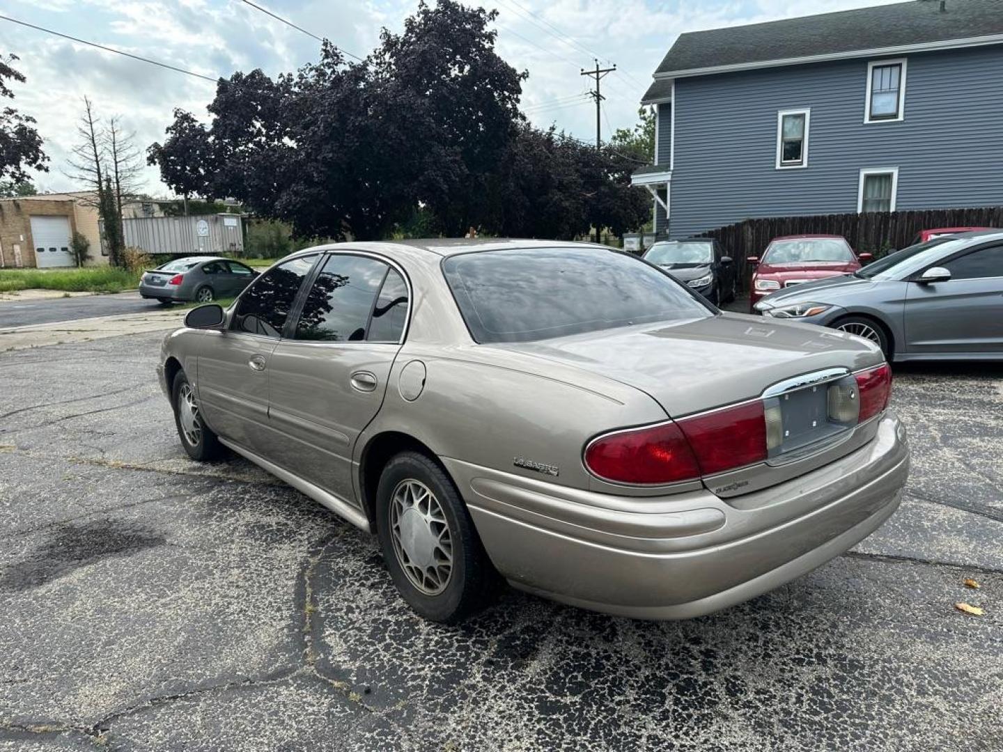 2002 TAN BUICK LESABRE CUSTOM (1G4HP54K424) with an 3.8L engine, Automatic transmission, located at 1708 Broadway, Rockford, IL, 61104, (815) 397-5010, 42.252522, -89.069359 - Photo#6