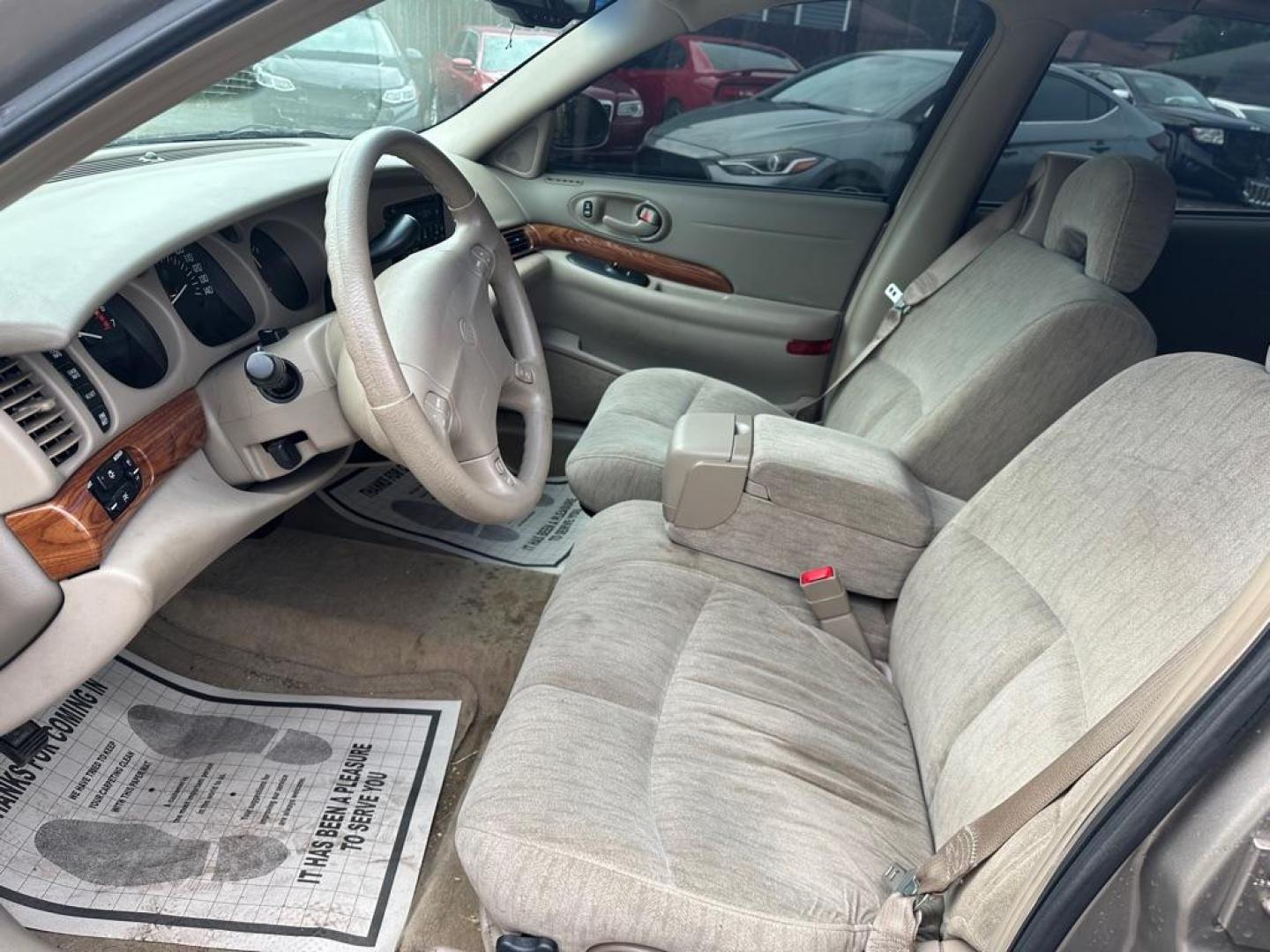 2002 TAN BUICK LESABRE CUSTOM (1G4HP54K424) with an 3.8L engine, Automatic transmission, located at 1708 Broadway, Rockford, IL, 61104, (815) 397-5010, 42.252522, -89.069359 - Photo#10