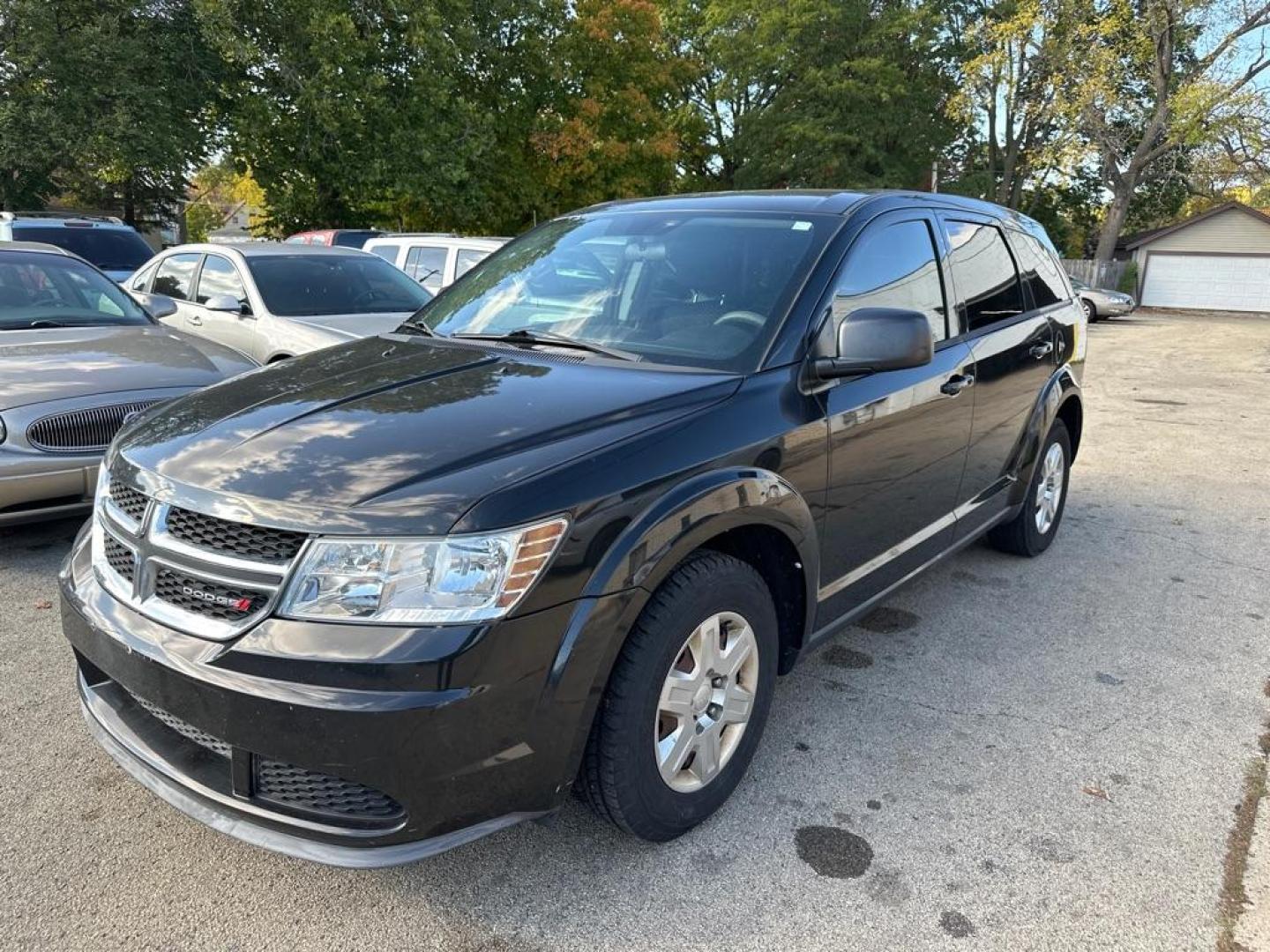 2012 BLACK DODGE JOURNEY SE (3C4PDCAB4CT) with an 2.4L engine, Automatic transmission, located at 1708 Broadway, Rockford, IL, 61104, (815) 397-5010, 42.252522, -89.069359 - Photo#0