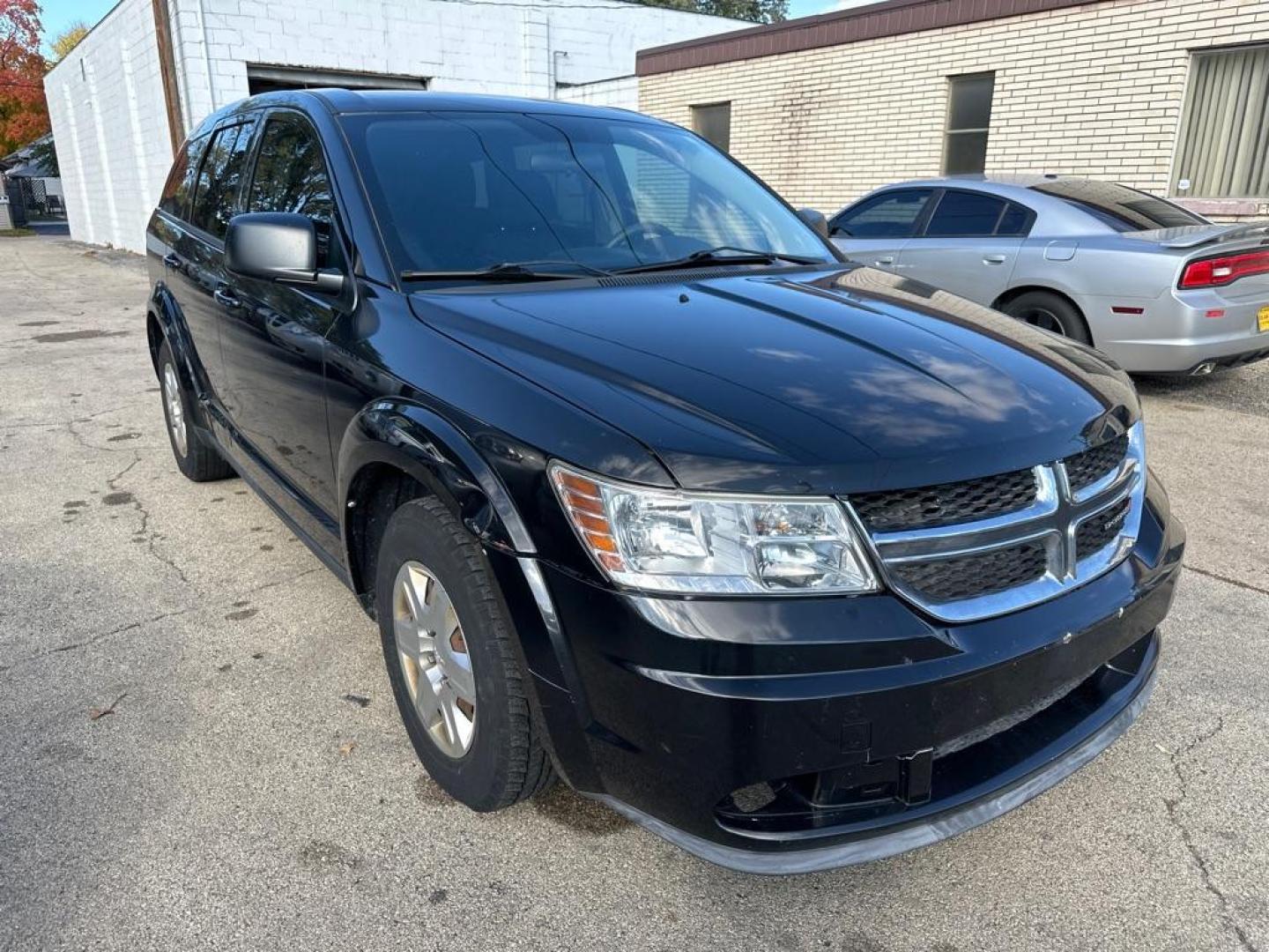 2012 BLACK DODGE JOURNEY SE (3C4PDCAB4CT) with an 2.4L engine, Automatic transmission, located at 1708 Broadway, Rockford, IL, 61104, (815) 397-5010, 42.252522, -89.069359 - Photo#3