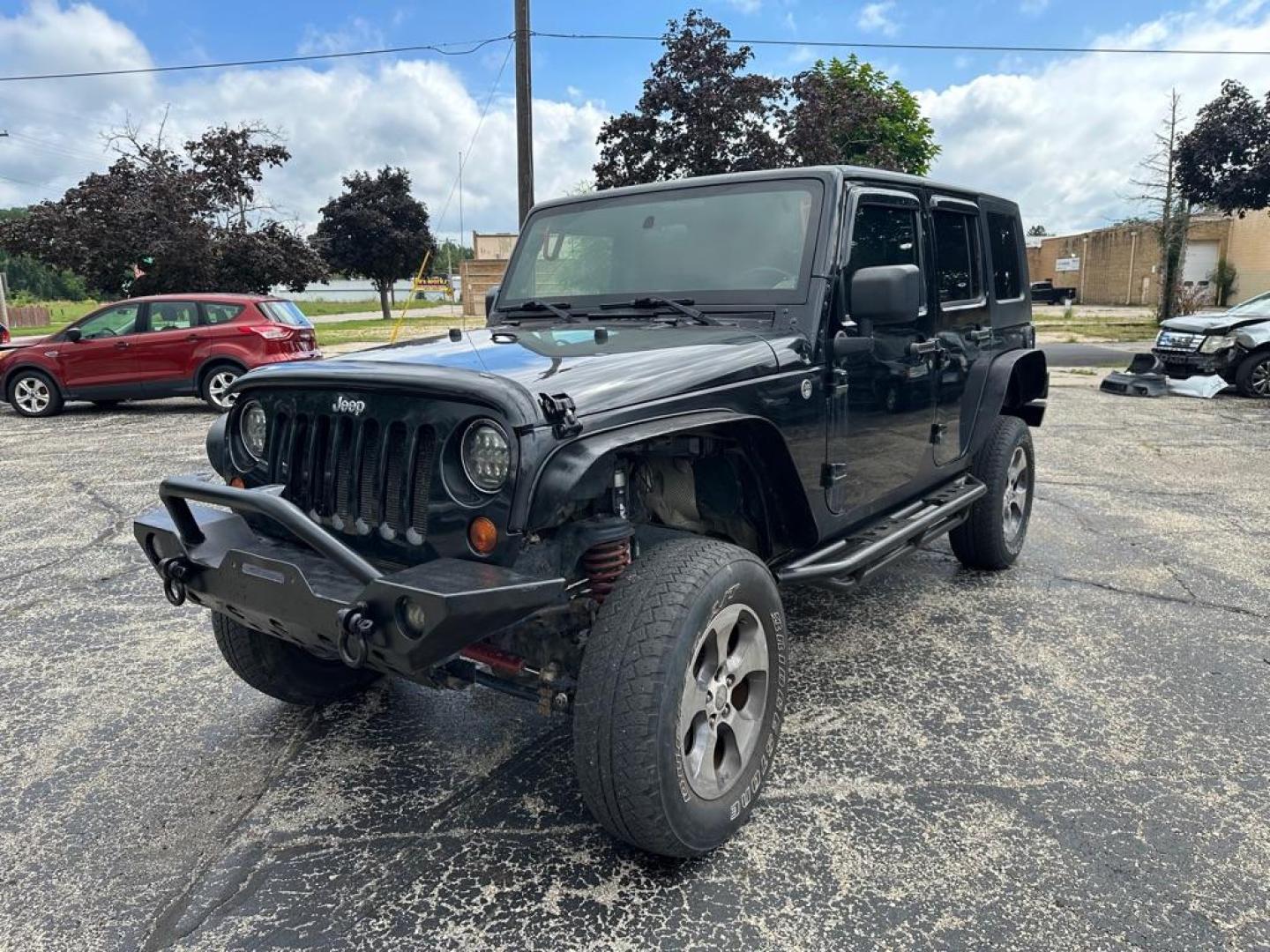 2008 BLACK JEEP WRANGLER UNLIMI RUBICON (1J4GA69178L) with an 3.8L engine, Automatic transmission, located at 1708 Broadway, Rockford, IL, 61104, (815) 397-5010, 42.252522, -89.069359 - Photo#0