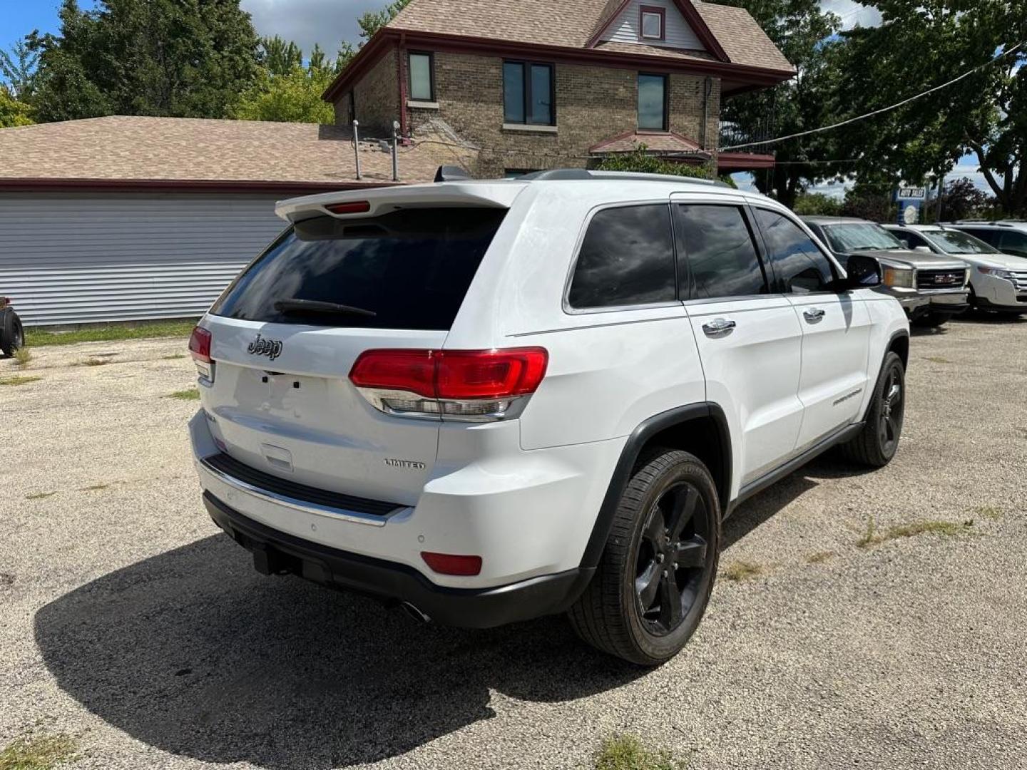 2014 WHITE JEEP GRAND CHEROKEE LIMITED (1C4RJFBG3EC) with an 3.6L engine, Automatic transmission, located at 1708 Broadway, Rockford, IL, 61104, (815) 397-5010, 42.252522, -89.069359 - Photo#4