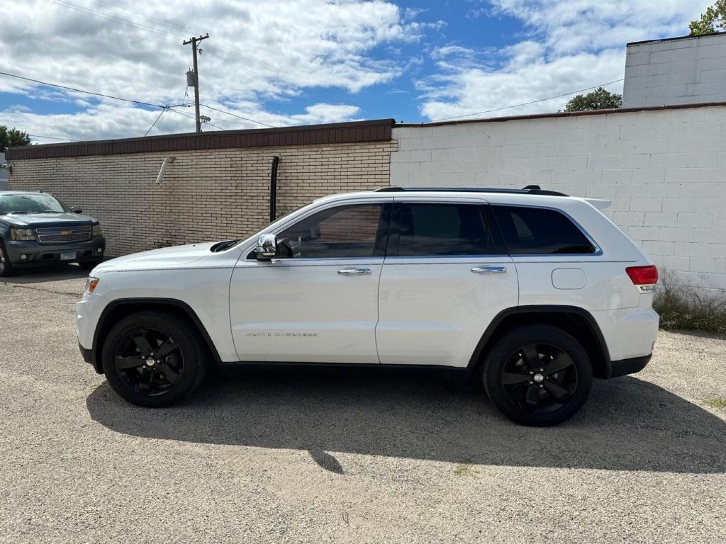 2014 WHITE JEEP GRAND CHEROKEE LIMITED (1C4RJFBG3EC) with an 3.6L engine, Automatic transmission, located at 1708 Broadway, Rockford, IL, 61104, (815) 397-5010, 42.252522, -89.069359 - Photo#7