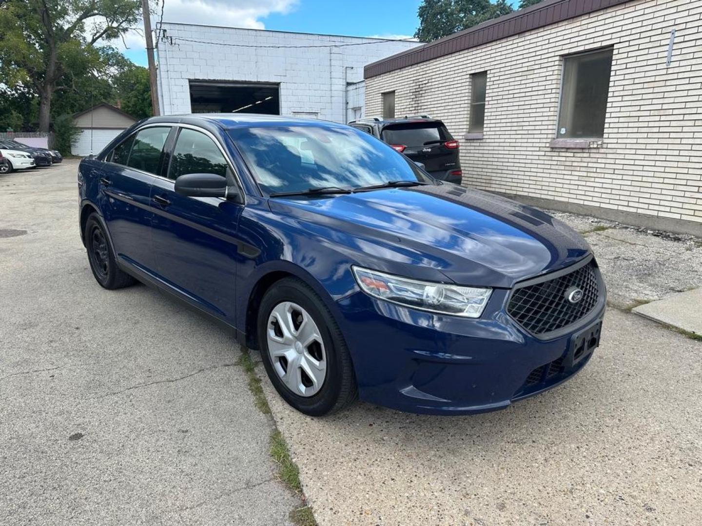2015 BLUE FORD TAURUS POLICE INTERCEPTOR (1FAHP2L80FG) with an 3.5L engine, Automatic transmission, located at 1708 Broadway, Rockford, IL, 61104, (815) 397-5010, 42.252522, -89.069359 - Photo#2