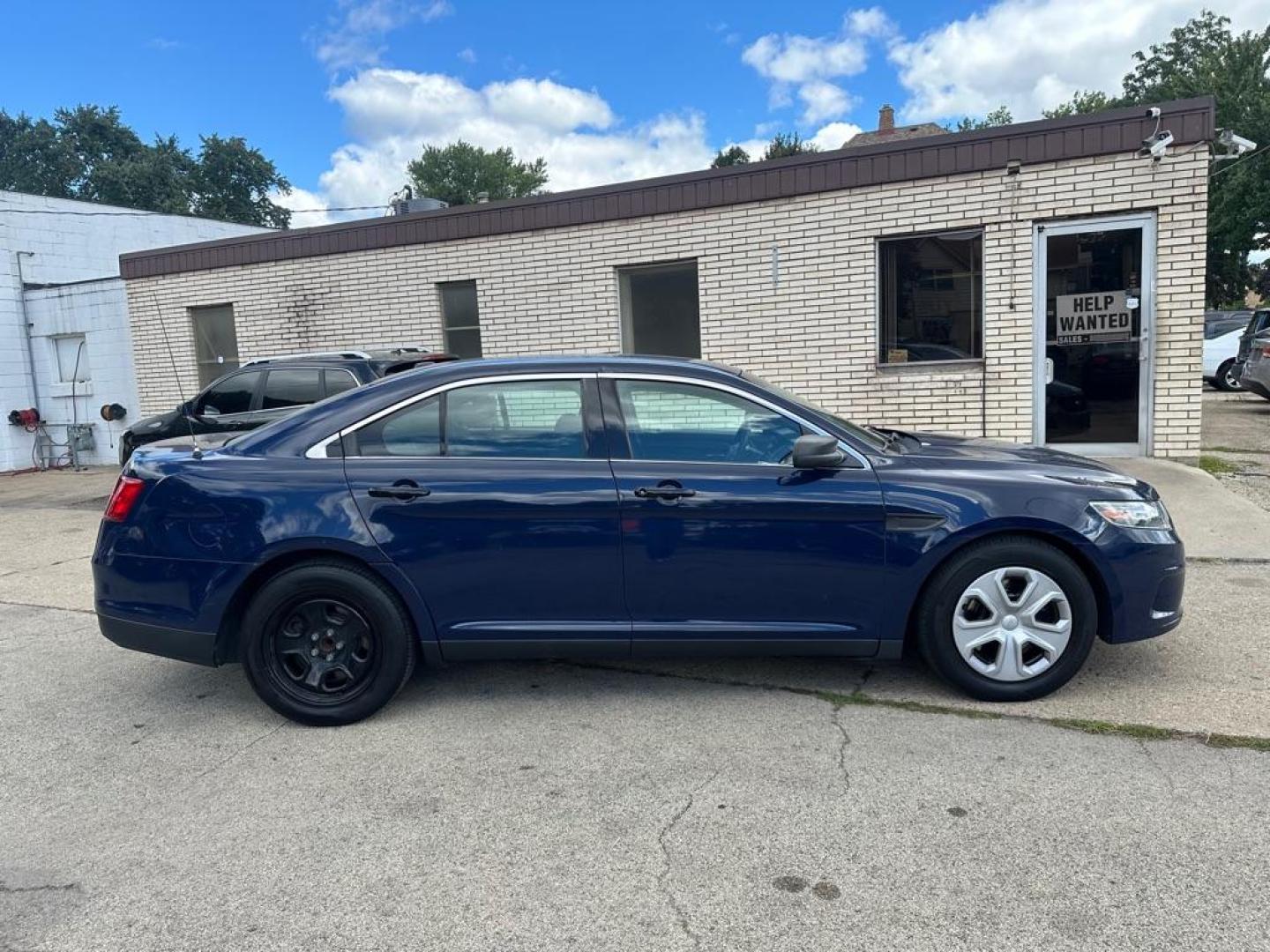 2015 BLUE FORD TAURUS POLICE INTERCEPTOR (1FAHP2L80FG) with an 3.5L engine, Automatic transmission, located at 1708 Broadway, Rockford, IL, 61104, (815) 397-5010, 42.252522, -89.069359 - Photo#3