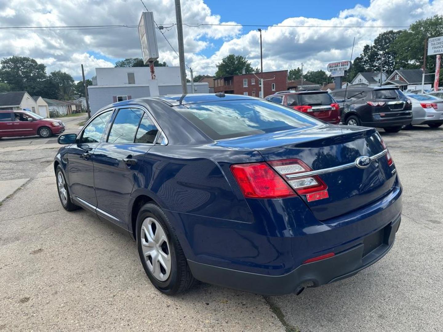 2015 BLUE FORD TAURUS POLICE INTERCEPTOR (1FAHP2L80FG) with an 3.5L engine, Automatic transmission, located at 1708 Broadway, Rockford, IL, 61104, (815) 397-5010, 42.252522, -89.069359 - Photo#6