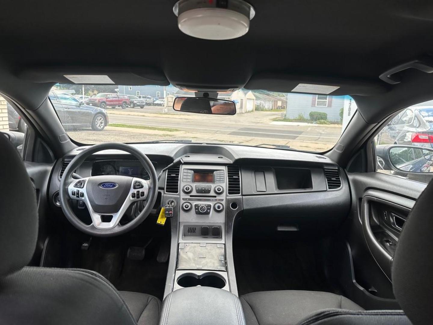 2015 BLUE FORD TAURUS POLICE INTERCEPTOR (1FAHP2L80FG) with an 3.5L engine, Automatic transmission, located at 1708 Broadway, Rockford, IL, 61104, (815) 397-5010, 42.252522, -89.069359 - Photo#8