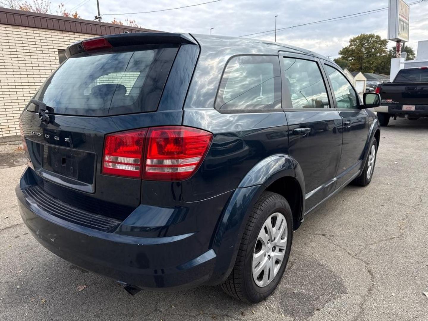 2014 BLUE DODGE JOURNEY SE (3C4PDCAB0ET) with an 2.4L engine, Automatic transmission, located at 1708 Broadway, Rockford, IL, 61104, (815) 397-5010, 42.252522, -89.069359 - Photo#2