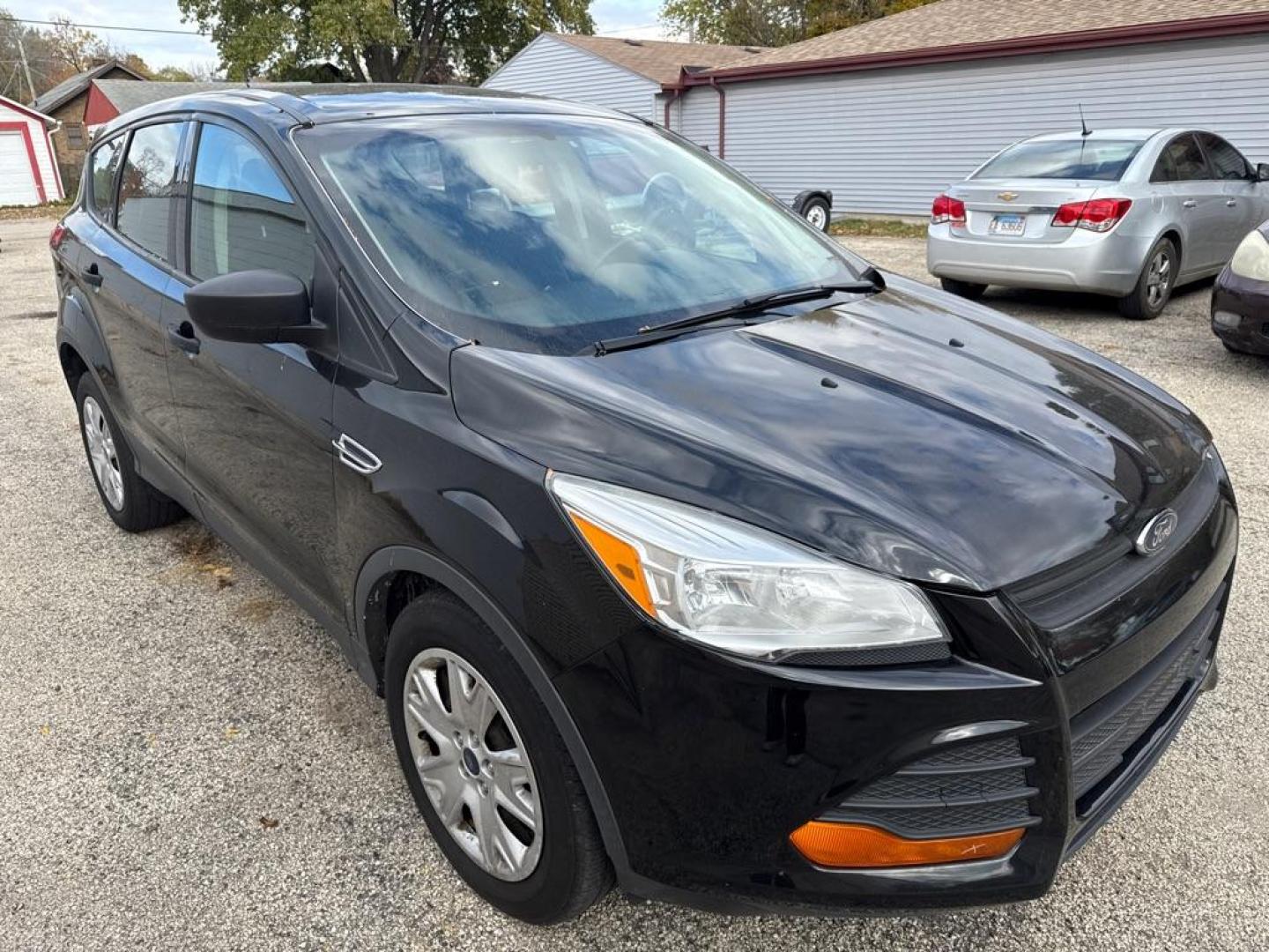2014 BLACK FORD ESCAPE S (1FMCU0F74EU) with an 2.5L engine, Automatic transmission, located at 1708 Broadway, Rockford, IL, 61104, (815) 397-5010, 42.252522, -89.069359 - Photo#1