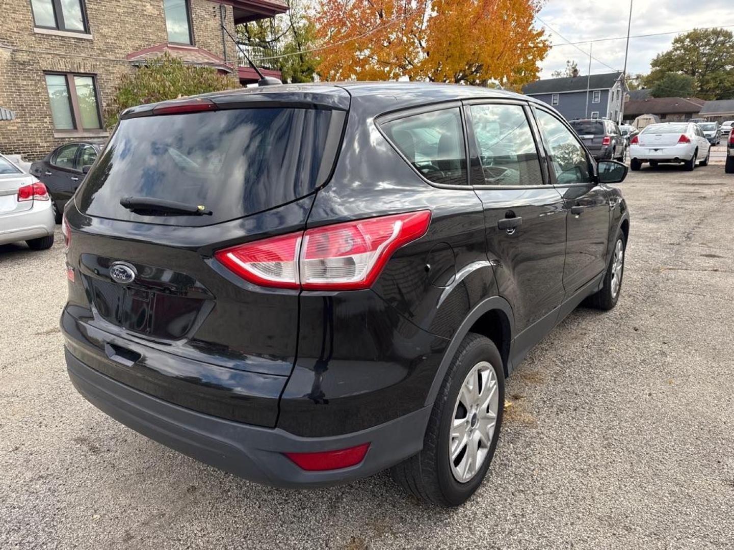 2014 BLACK FORD ESCAPE S (1FMCU0F74EU) with an 2.5L engine, Automatic transmission, located at 1708 Broadway, Rockford, IL, 61104, (815) 397-5010, 42.252522, -89.069359 - Photo#2