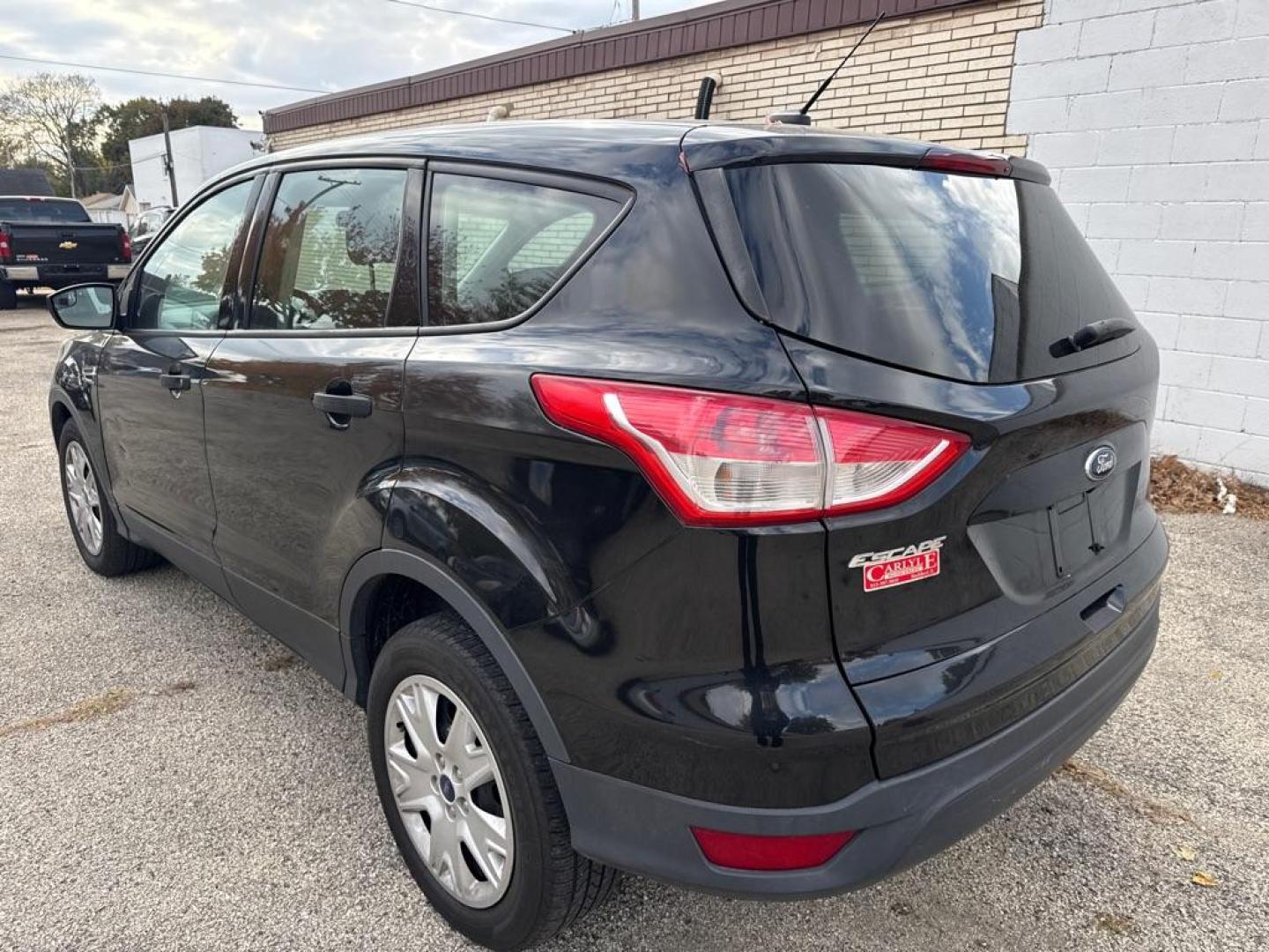 2014 BLACK FORD ESCAPE S (1FMCU0F74EU) with an 2.5L engine, Automatic transmission, located at 1708 Broadway, Rockford, IL, 61104, (815) 397-5010, 42.252522, -89.069359 - Photo#3