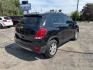 2019 BLACK CHEVROLET TRAX 1LT (KL7CJLSB1KB) with an 1.4L engine, Automatic transmission, located at 1708 Broadway, Rockford, IL, 61104, (815) 397-5010, 42.252522, -89.069359 - Photo#2