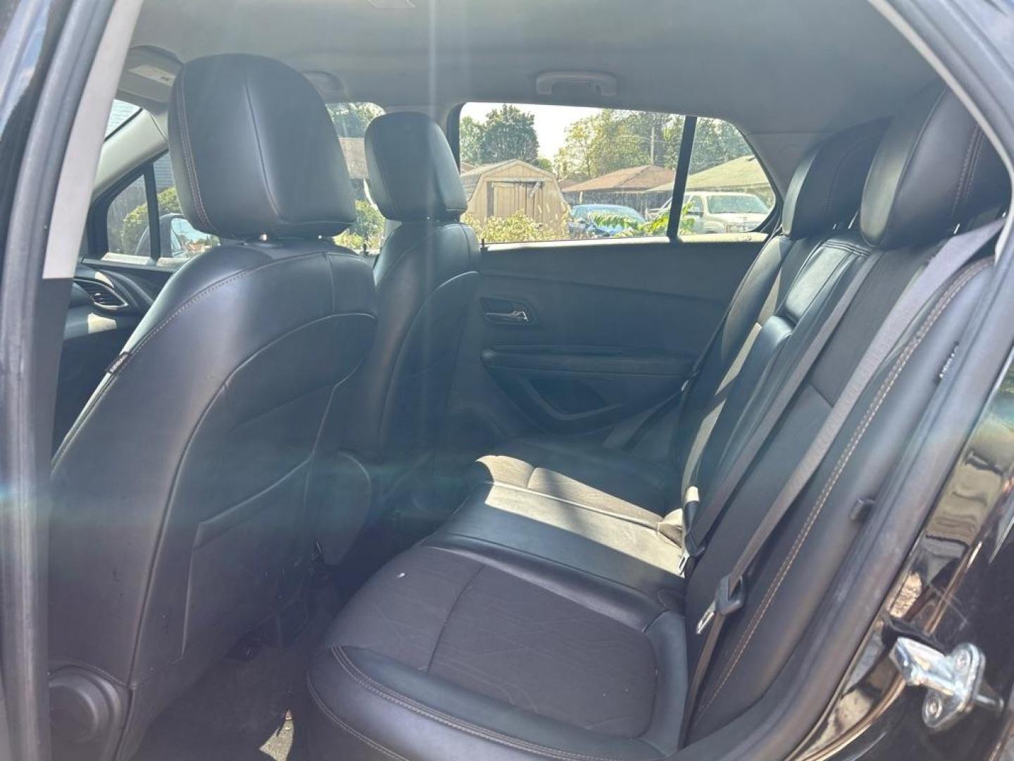 2019 BLACK CHEVROLET TRAX 1LT (KL7CJLSB1KB) with an 1.4L engine, Automatic transmission, located at 1708 Broadway, Rockford, IL, 61104, (815) 397-5010, 42.252522, -89.069359 - Photo#4