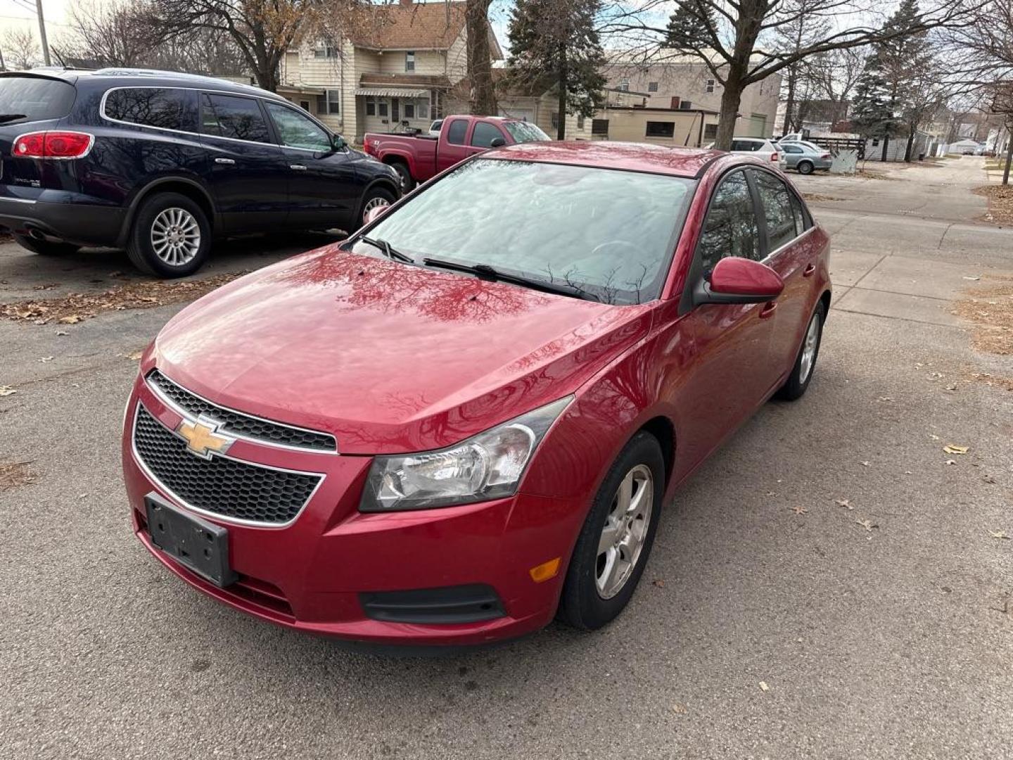 2014 RED CHEVROLET CRUZE LT (1G1PC5SB4E7) with an 1.4L engine, Automatic transmission, located at 1708 Broadway, Rockford, IL, 61104, (815) 397-5010, 42.252522, -89.069359 - Photo#0