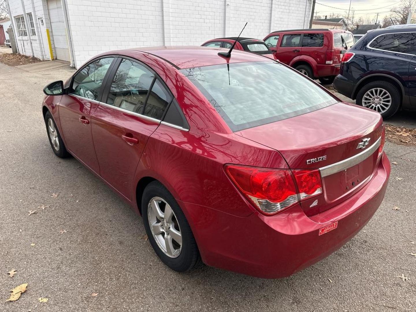 2014 RED CHEVROLET CRUZE LT (1G1PC5SB4E7) with an 1.4L engine, Automatic transmission, located at 1708 Broadway, Rockford, IL, 61104, (815) 397-5010, 42.252522, -89.069359 - Photo#1