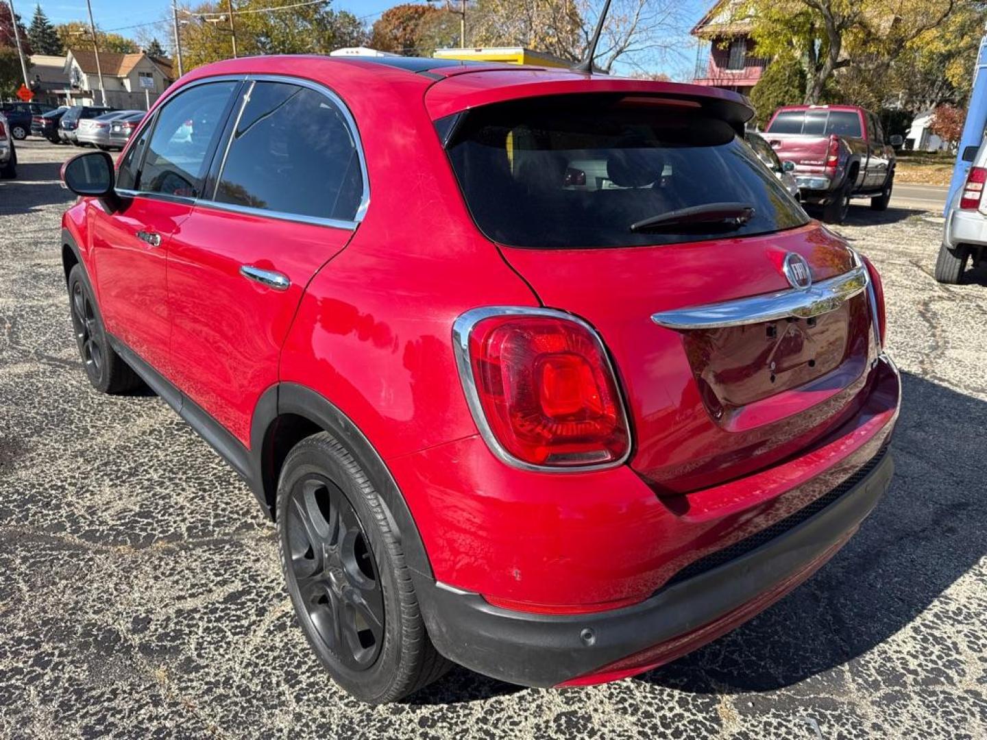 2016 RED FIAT 500X LOUNGE (ZFBCFYDTXGP) with an 2.4L engine, Automatic transmission, located at 1708 Broadway, Rockford, IL, 61104, (815) 397-5010, 42.252522, -89.069359 - Photo#3