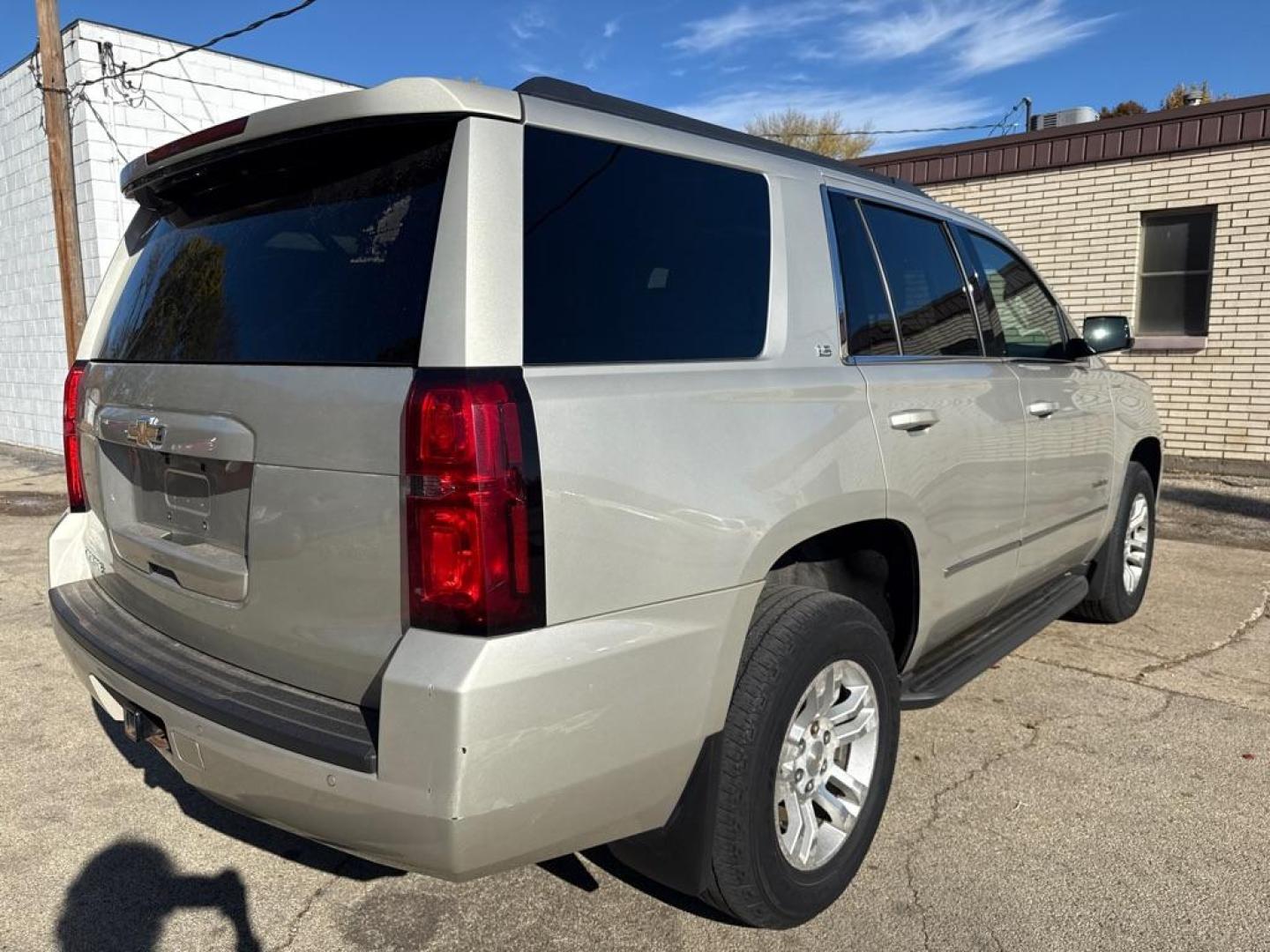 2015 GOLD CHEVROLET TAHOE 1500 LS (1GNSKAEC4FR) with an 5.3L engine, Automatic transmission, located at 1708 Broadway, Rockford, IL, 61104, (815) 397-5010, 42.252522, -89.069359 - Photo#2