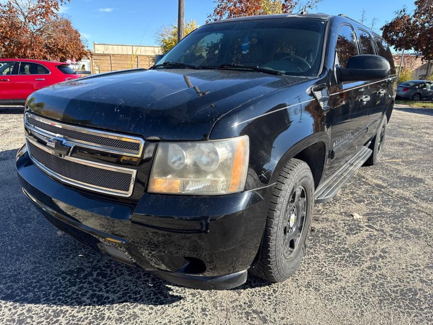 2007 BLACK CHEVROLET SUBURBAN 1500 (1GNFC16J47J) with an 5.3L engine, Automatic transmission, located at 1708 Broadway, Rockford, IL, 61104, (815) 397-5010, 42.252522, -89.069359 - Photo#0