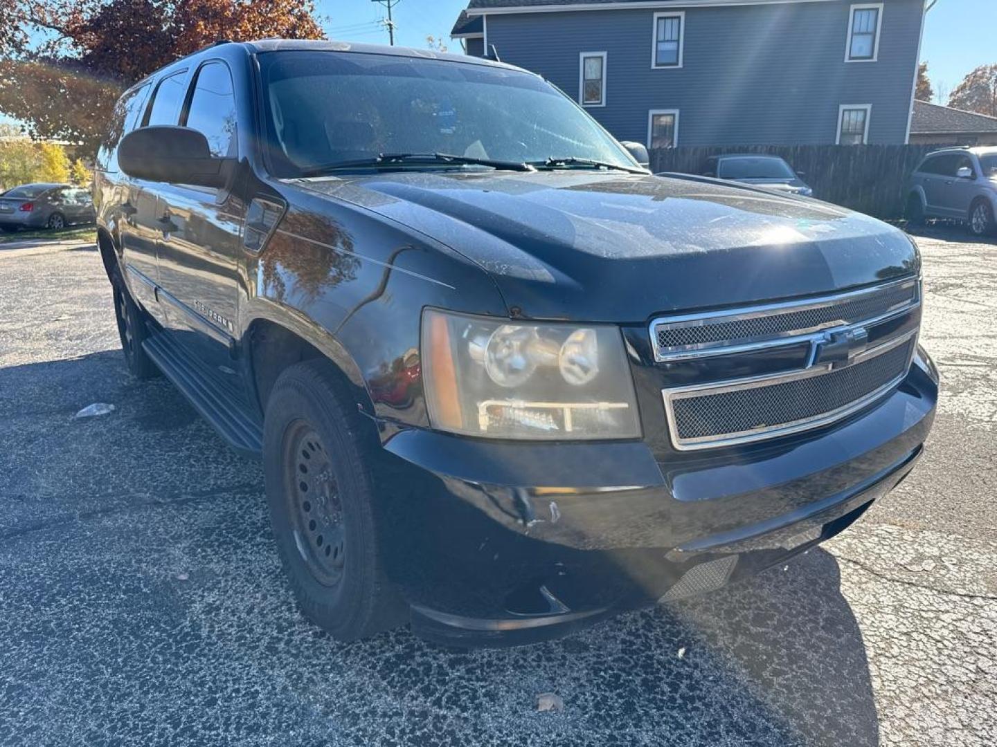 2007 BLACK CHEVROLET SUBURBAN 1500 (1GNFC16J47J) with an 5.3L engine, Automatic transmission, located at 1708 Broadway, Rockford, IL, 61104, (815) 397-5010, 42.252522, -89.069359 - Photo#1