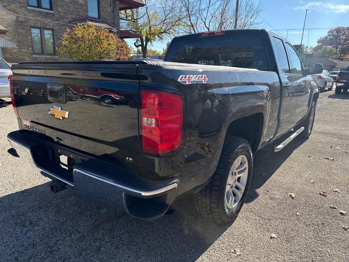 2016 BLACK CHEVROLET SILVERADO 1500 LT (1GCVKREHXGZ) with an 4.3L engine, Automatic transmission, located at 1708 Broadway, Rockford, IL, 61104, (815) 397-5010, 42.252522, -89.069359 - Photo#2