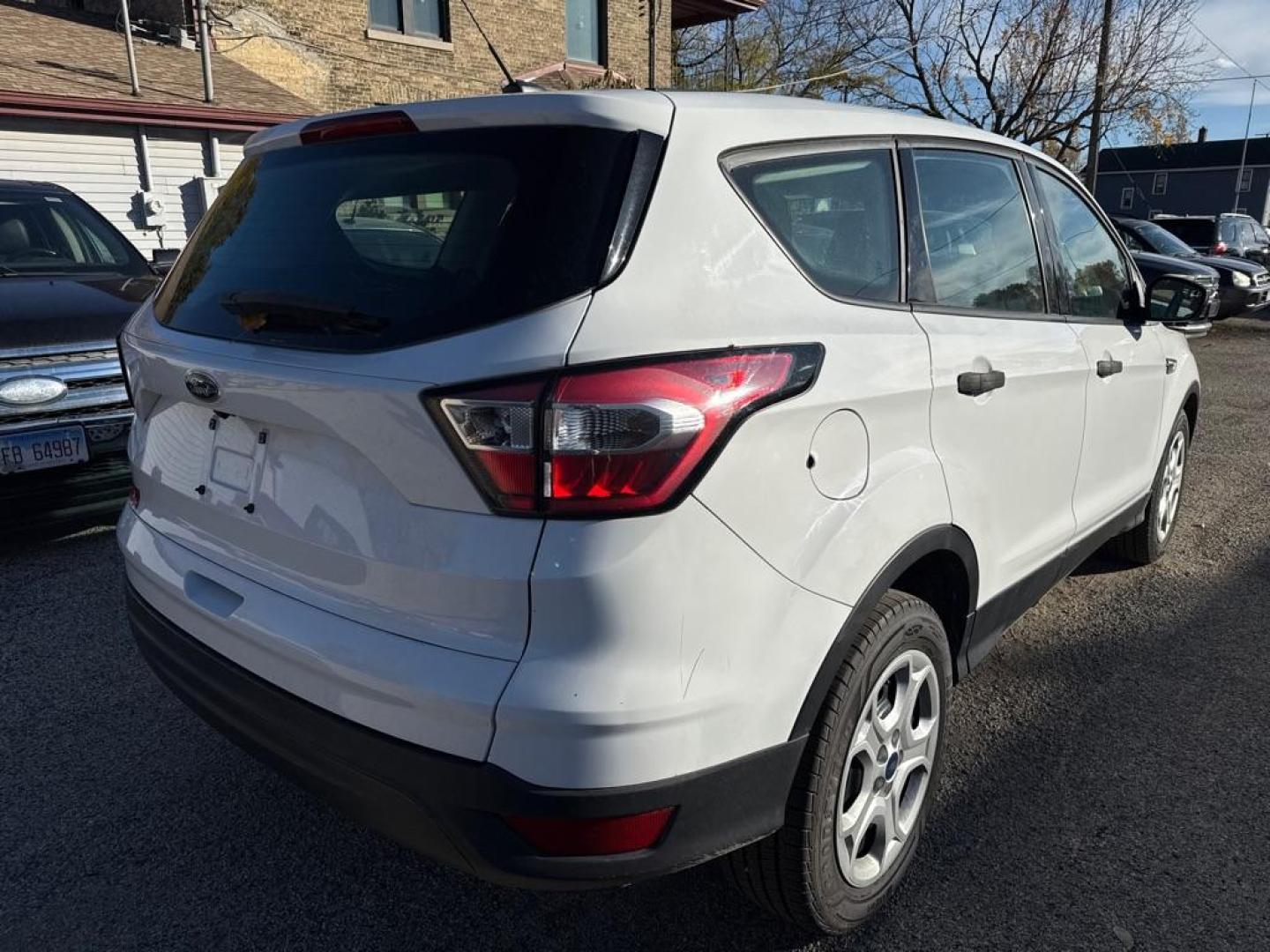 2017 WHITE FORD ESCAPE S (1FMCU0F71HU) with an 2.5L engine, Automatic transmission, located at 1708 Broadway, Rockford, IL, 61104, (815) 397-5010, 42.252522, -89.069359 - Photo#2