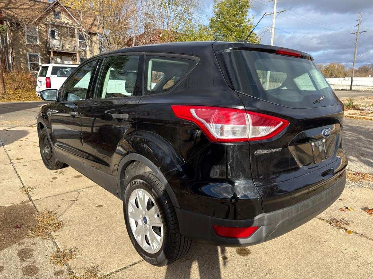 2013 BLACK FORD ESCAPE S (1FMCU0F7XDU) with an 2.5L engine, Automatic transmission, located at 1708 Broadway, Rockford, IL, 61104, (815) 397-5010, 42.252522, -89.069359 - Photo#3