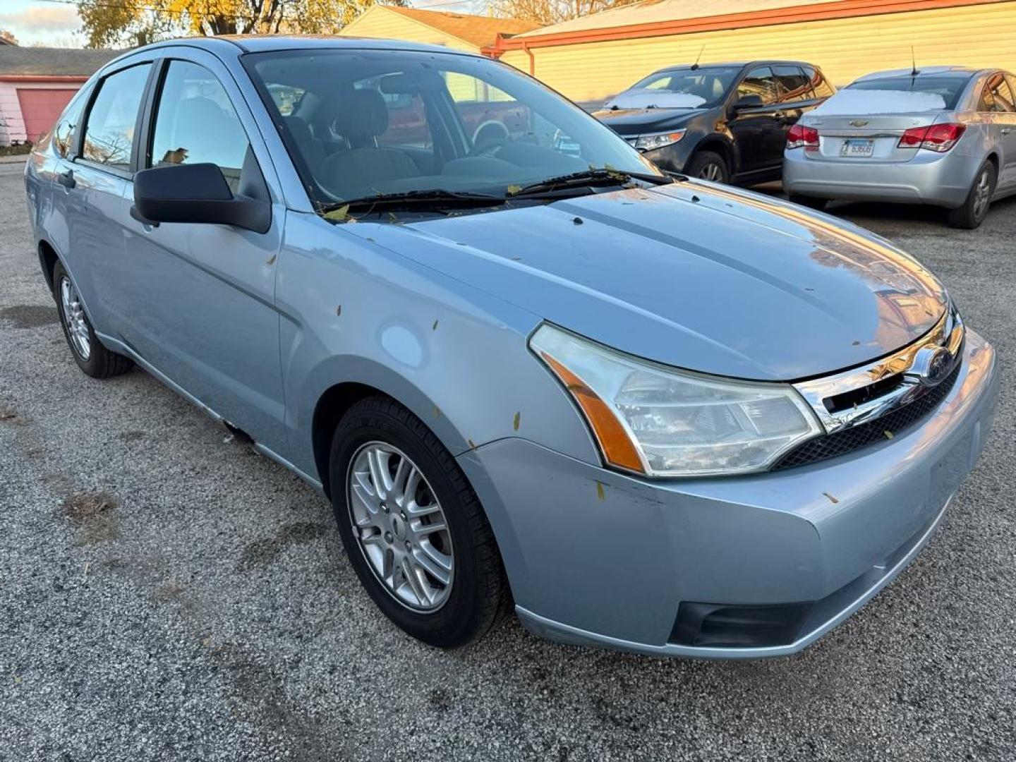 2009 BLUE FORD FOCUS SE (1FAHP35N29W) with an 2.0L engine, Automatic transmission, located at 1708 Broadway, Rockford, IL, 61104, (815) 397-5010, 42.252522, -89.069359 - Photo#1
