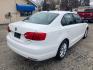 2011 WHITE VOLKSWAGEN JETTA SE (3VWBX7AJXBM) with an 2.5L engine, Automatic transmission, located at 1708 Broadway, Rockford, IL, 61104, (815) 397-5010, 42.252522, -89.069359 - Photo#2