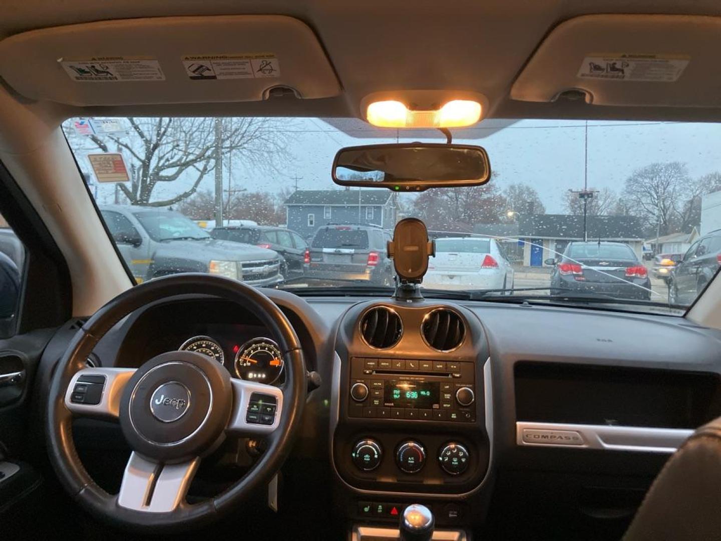 2016 BLUE JEEP COMPASS LATITUDE (1C4NJDEB6GD) with an 2.4L engine, Automatic transmission, located at 1708 Broadway, Rockford, IL, 61104, (815) 397-5010, 42.252522, -89.069359 - Photo#5