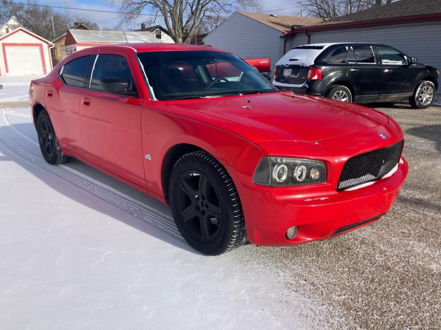 2008 RED DODGE CHARGER (2B3KA43G38H) with an 3.5L engine, Automatic transmission, located at 1708 Broadway, Rockford, IL, 61104, (815) 397-5010, 42.252522, -89.069359 - Photo#1